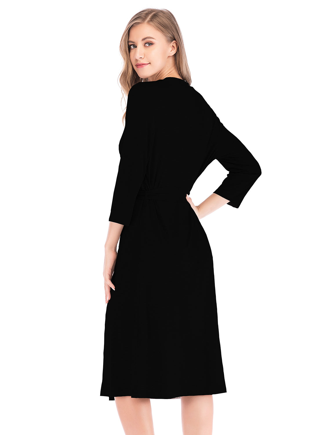 Blonde woman in black Plunge Tie Front Night Dress, three-quarter view, hand on hip