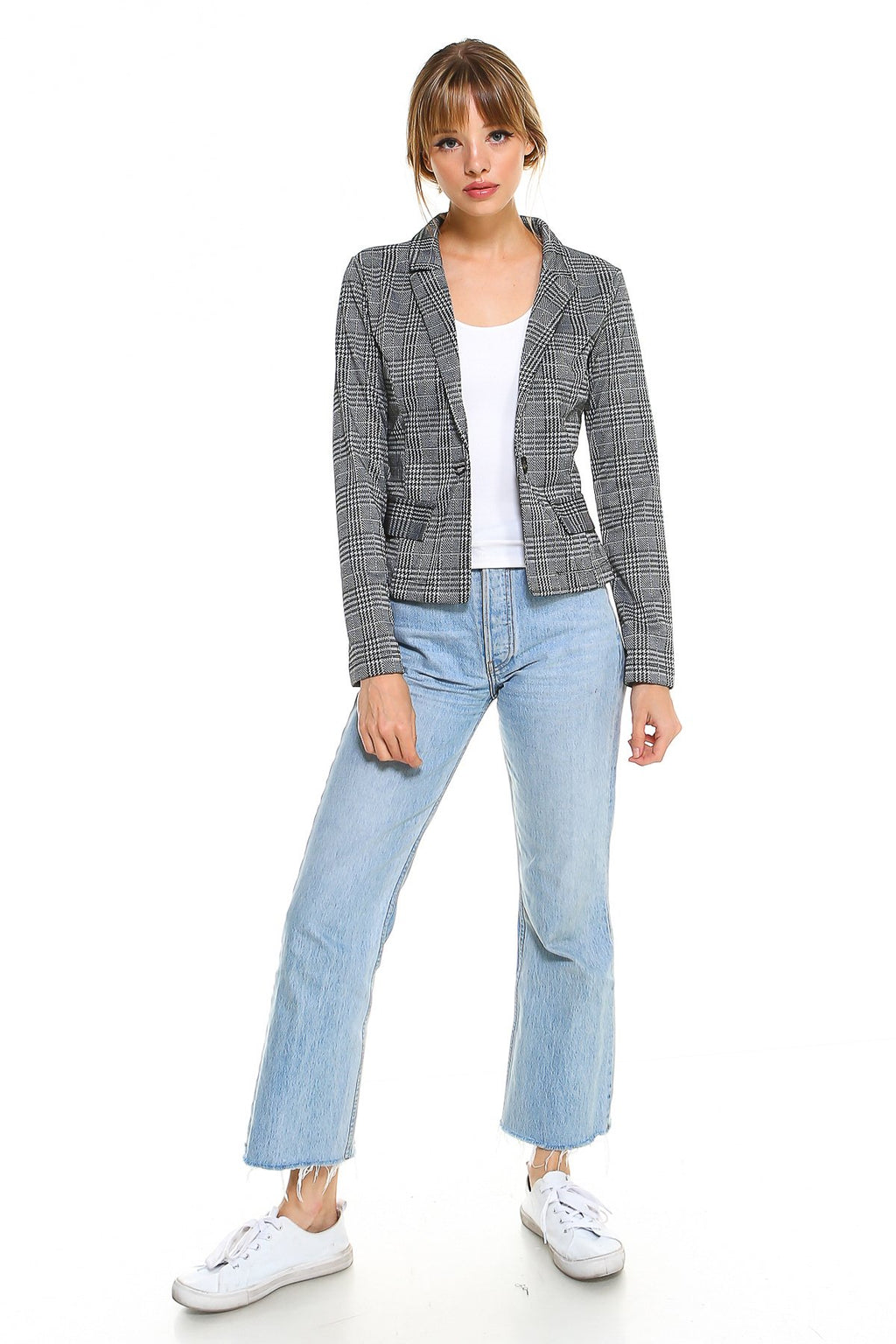 Classic Plaid Fitted Blazer in black and white plaid, worn with a white top and light wash jeans