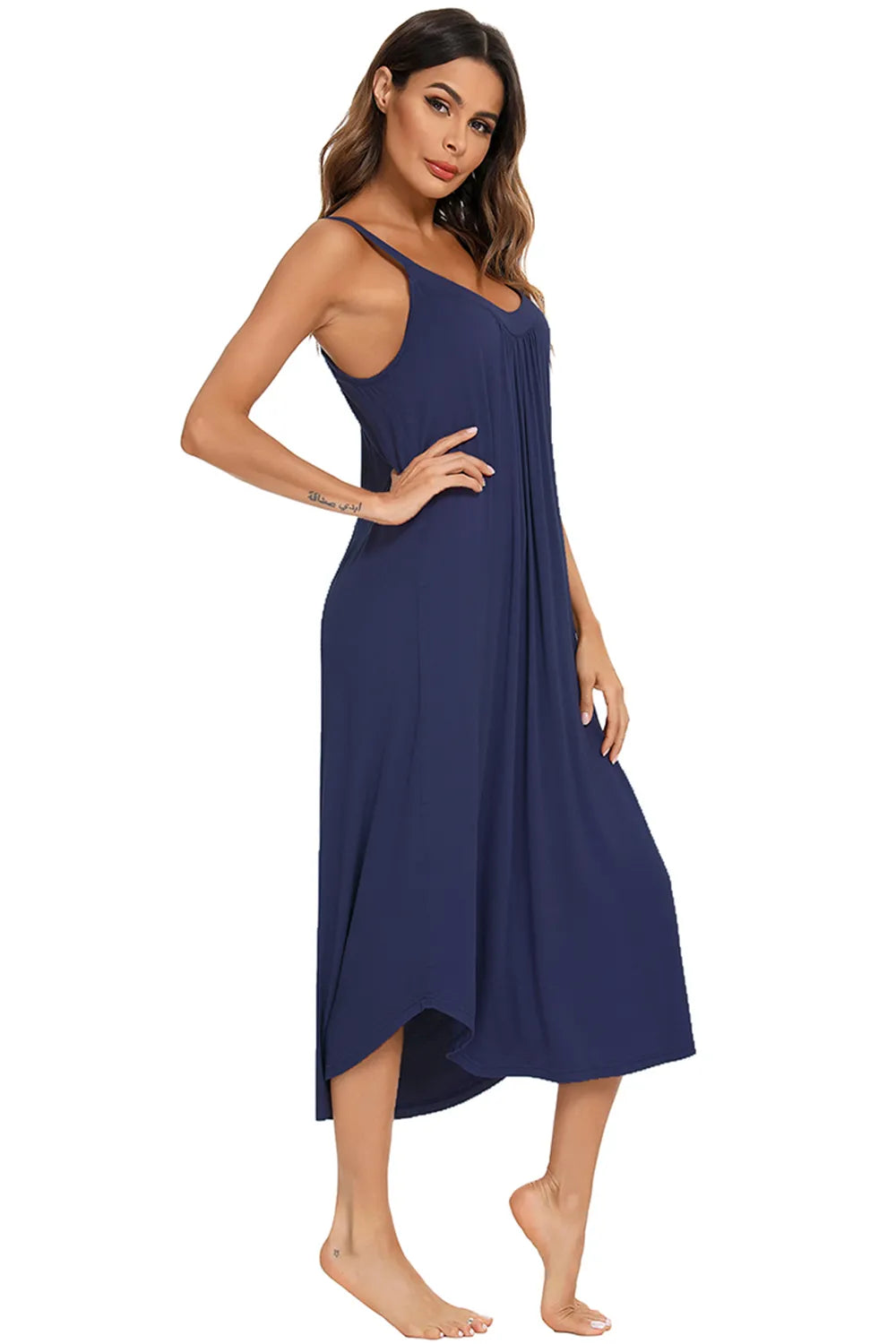 V-Neck Midi Lounge Dress in navy blue, worn by a woman with her hand on her hip