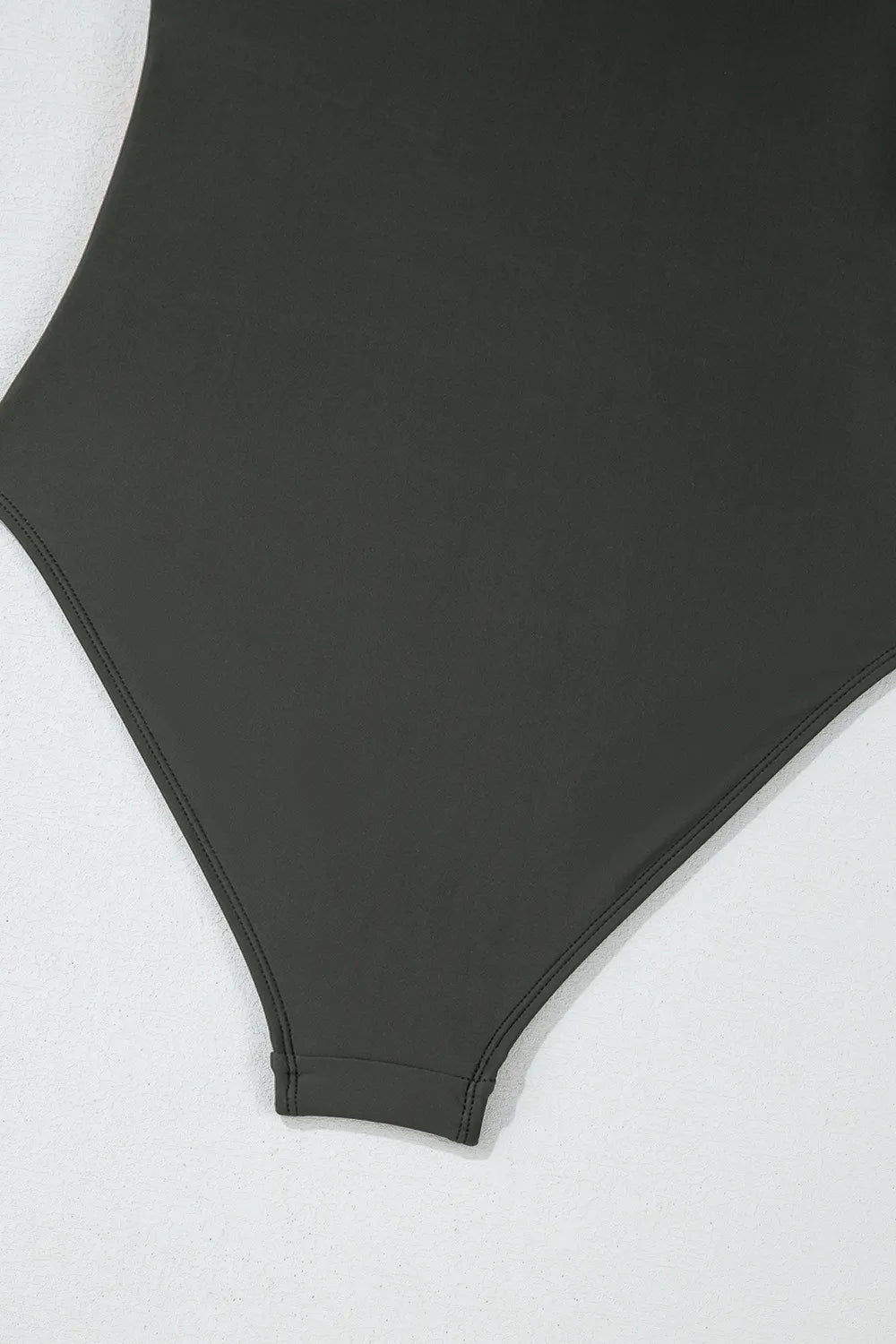 Close up of the bottom of a Color Block Padded Square Neck One Piece Swimsuit