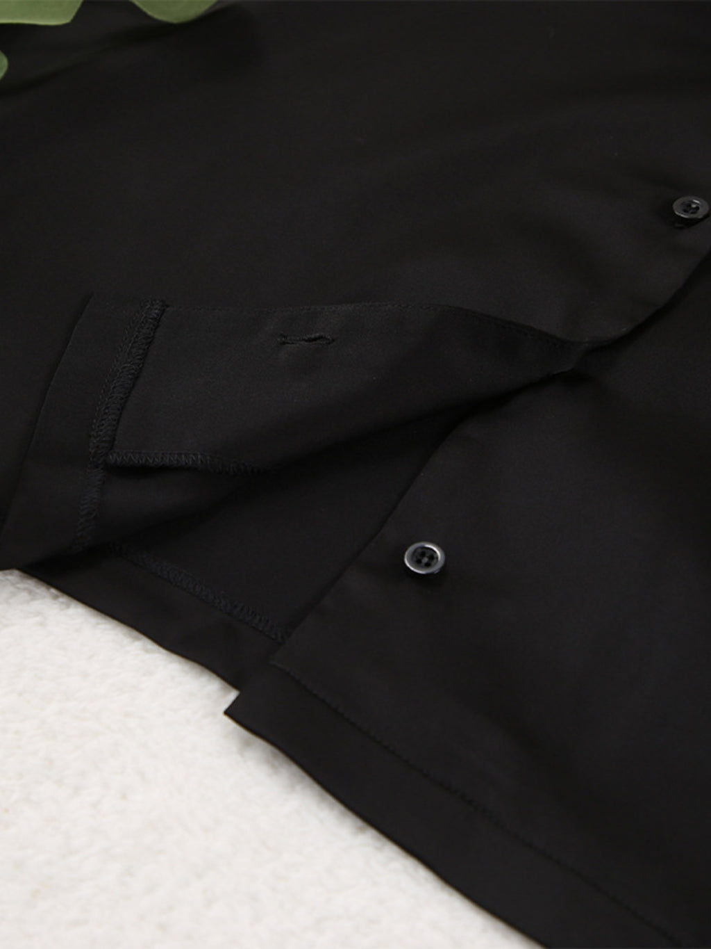 Close up of the black Long Sleeve Top and Wide Leg Pants Lounge Set fabric and button details