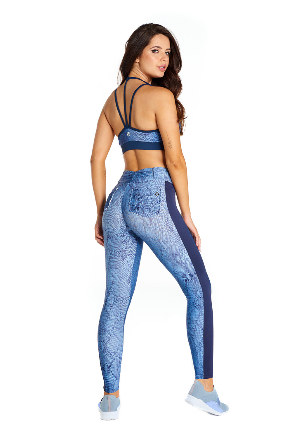 Blue Jungle Sports Bra and matching leggings with snake print and dark blue side panels