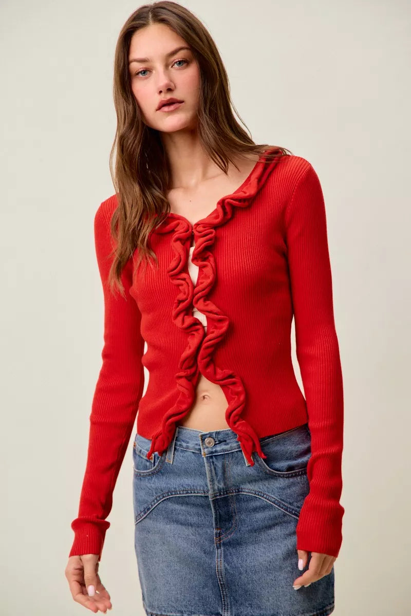 SO ME Cascade Ruffle Ribbed Sweater Cardigan in red with ruffle detail, paired with a denim skirt