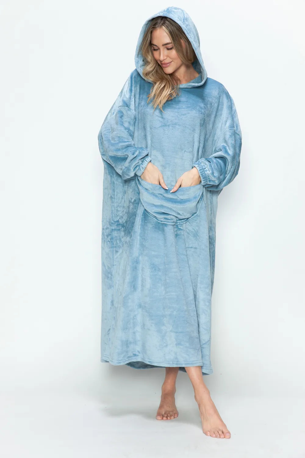 Double Take Full Size Pocketed Hooded Midi Lounge Dress in light blue, with model's hands in front pocket