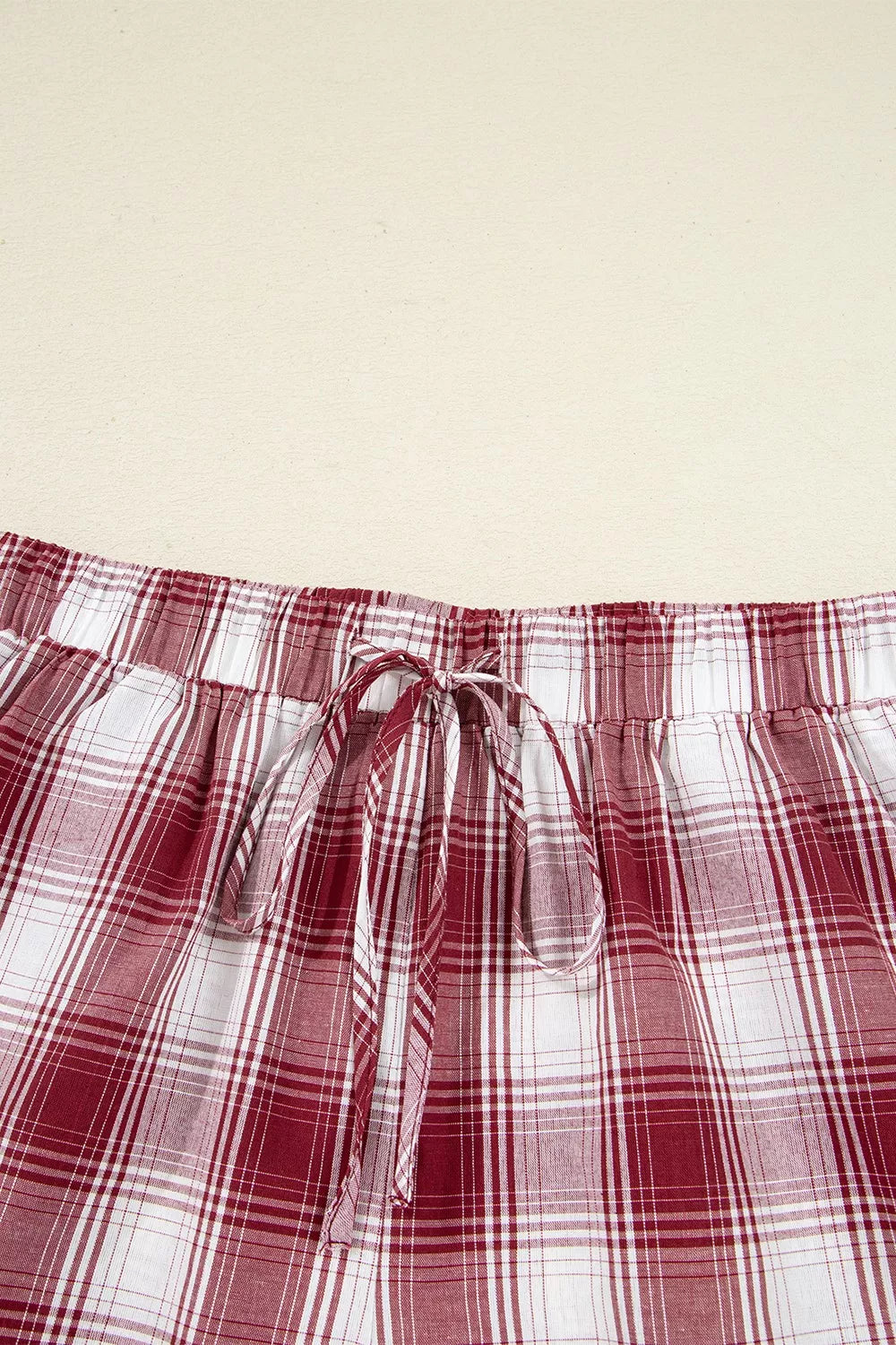 Close up of the drawstring on the Plaid Long Sleeve Shirt and Drawstring Shorts Lounge Set