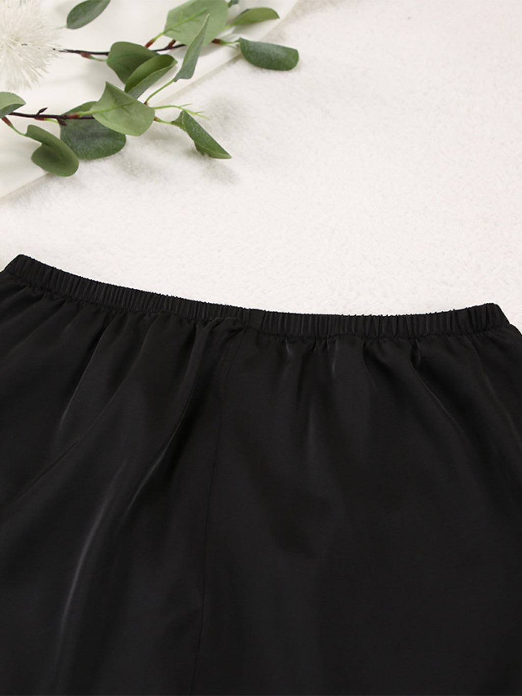 Close up of the elastic waistband of the black Long Sleeve Top and Wide Leg Pants Lounge Set