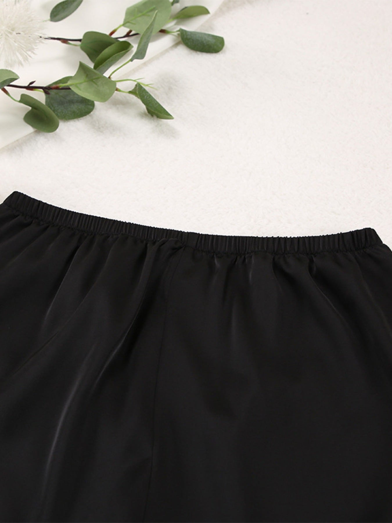 Close up of the elastic waistband of the black Long Sleeve Top and Wide Leg Pants Lounge Set