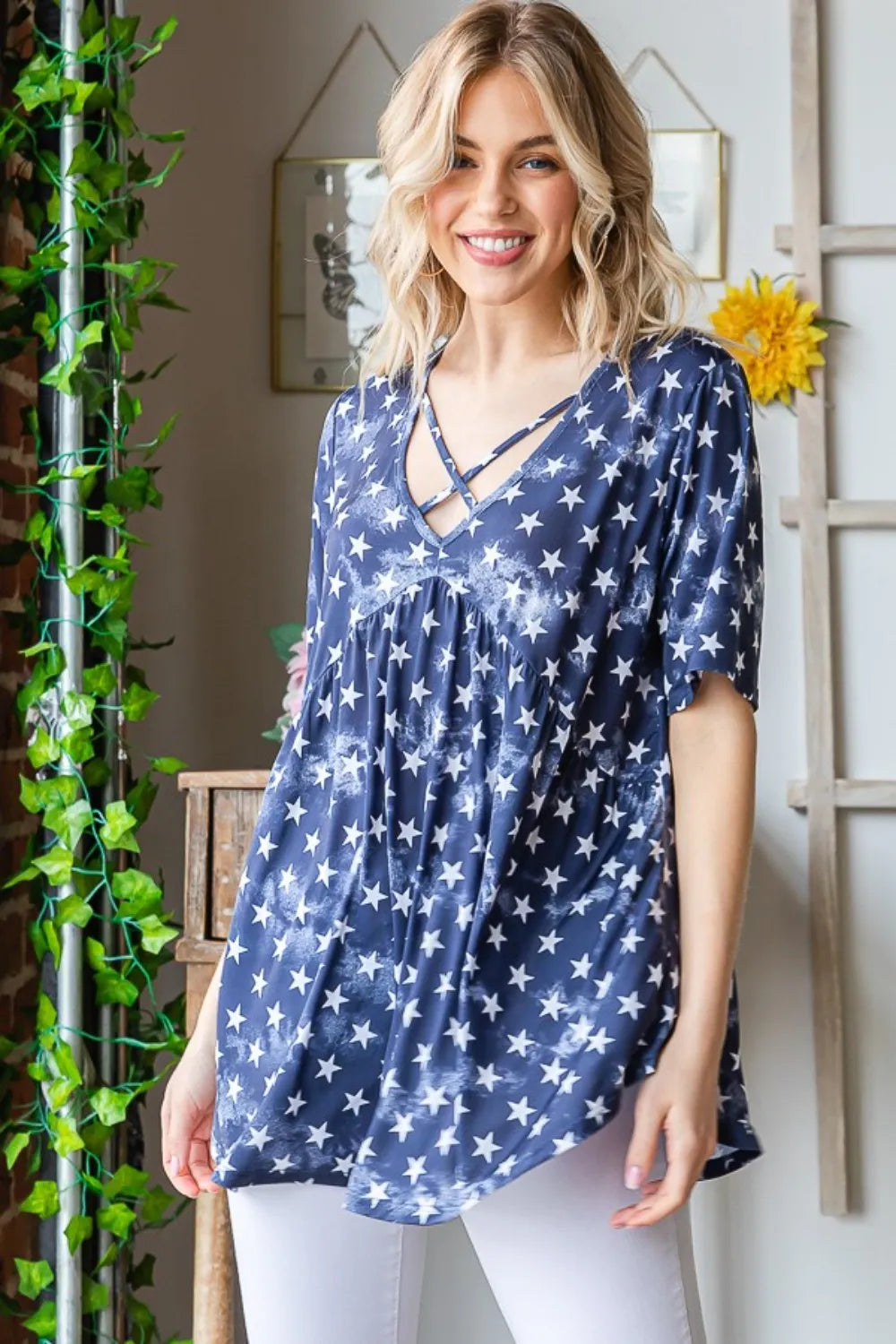 Short Sleeve Crisscross Star Babydoll Top in blue with white stars
