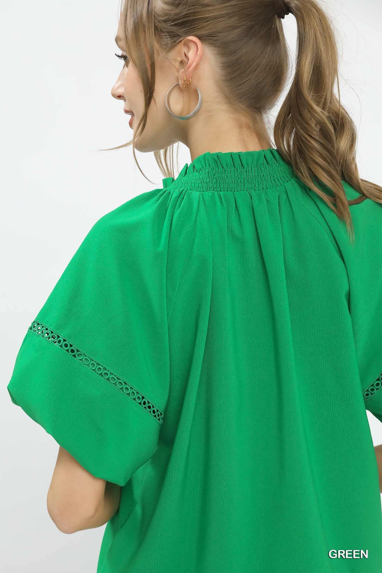 Umgee Lace Trim Peasant Top in green with smocked neckline and lace trim on sleeves
