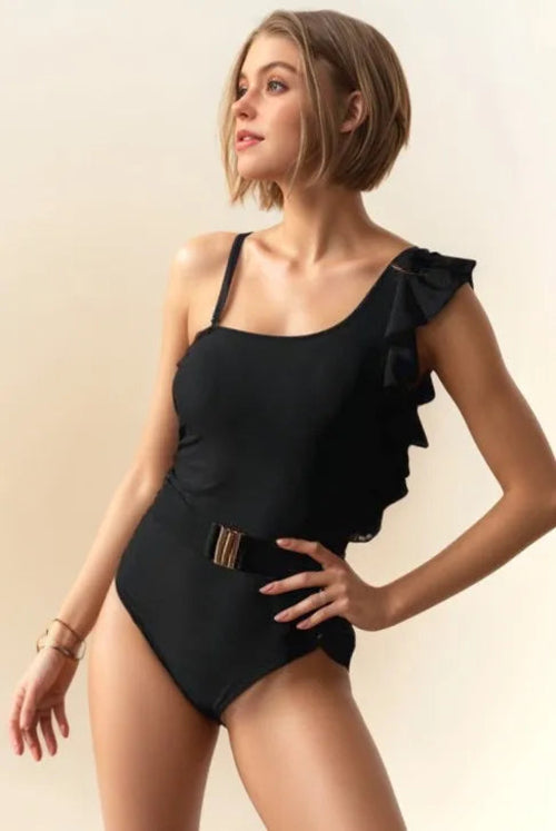 Davi & Dani Solid One Shoulder Ruffle One Piece Swimsuit in black with a gold buckle