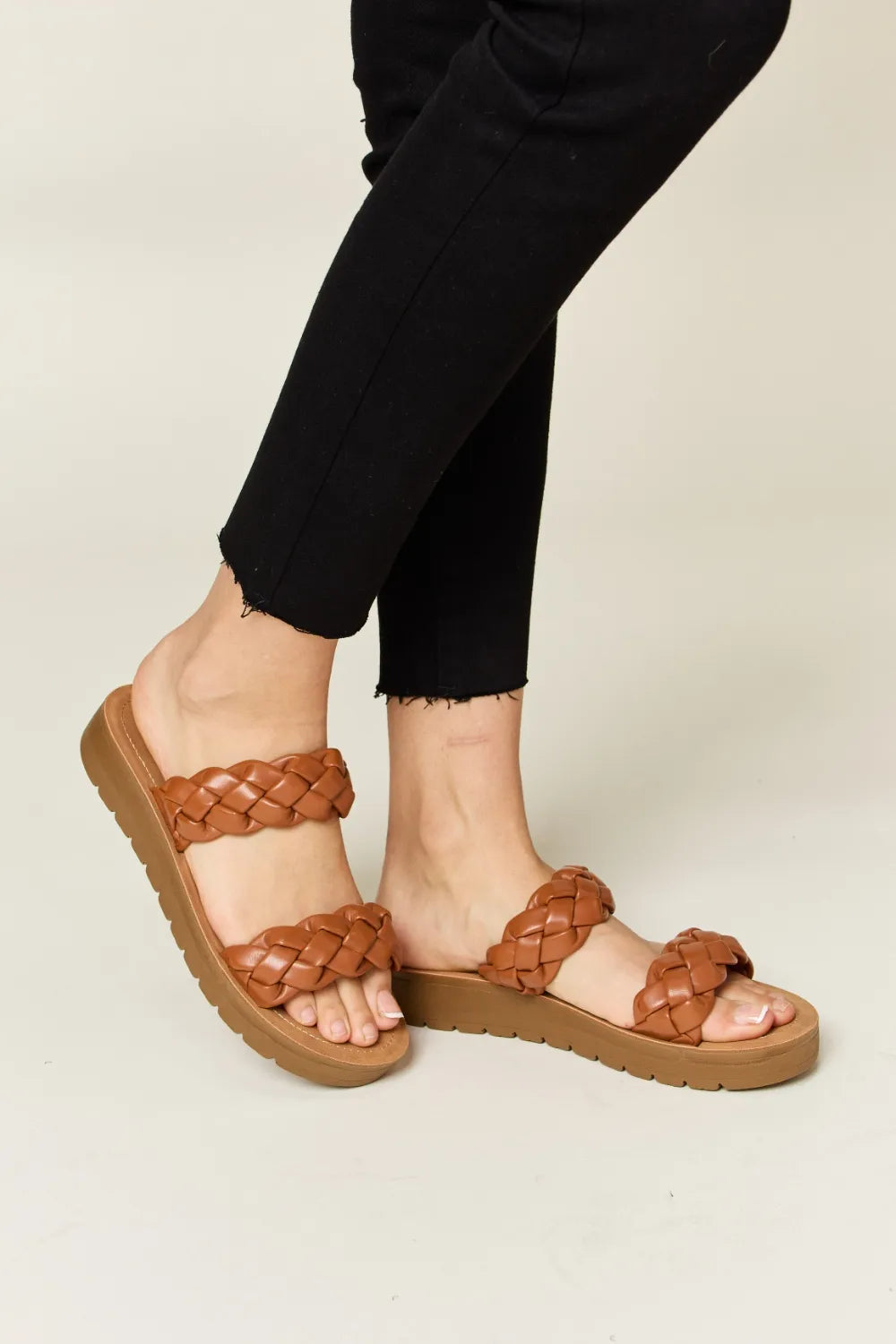 Woven Dual Band Platform Sandals in brown on a person's feet