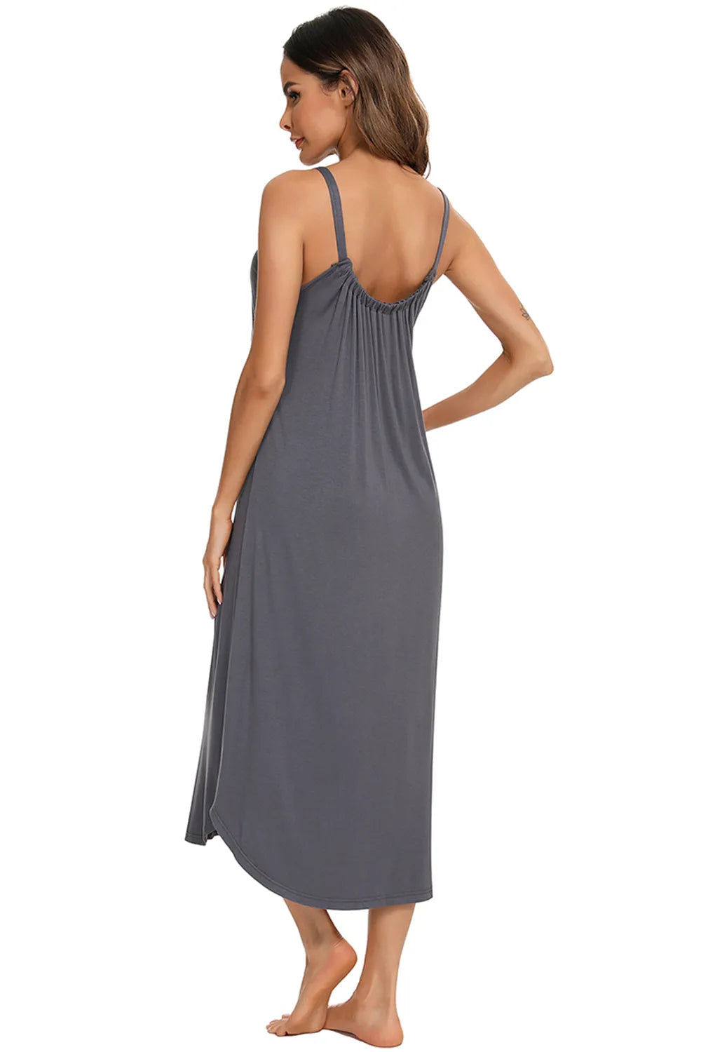 Woman from behind wearing a V-neck midi lounge dress in dark grey