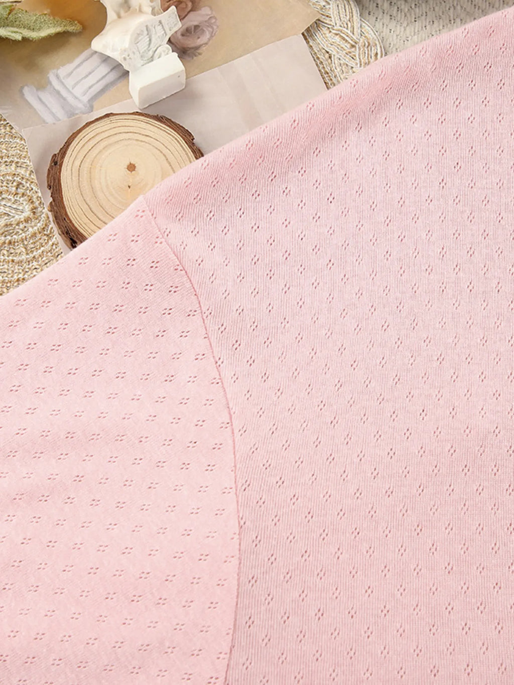 Close-up of the pink Tie Waist Kimono Sleeve Lounge Nightgown fabric with a subtle diamond pattern