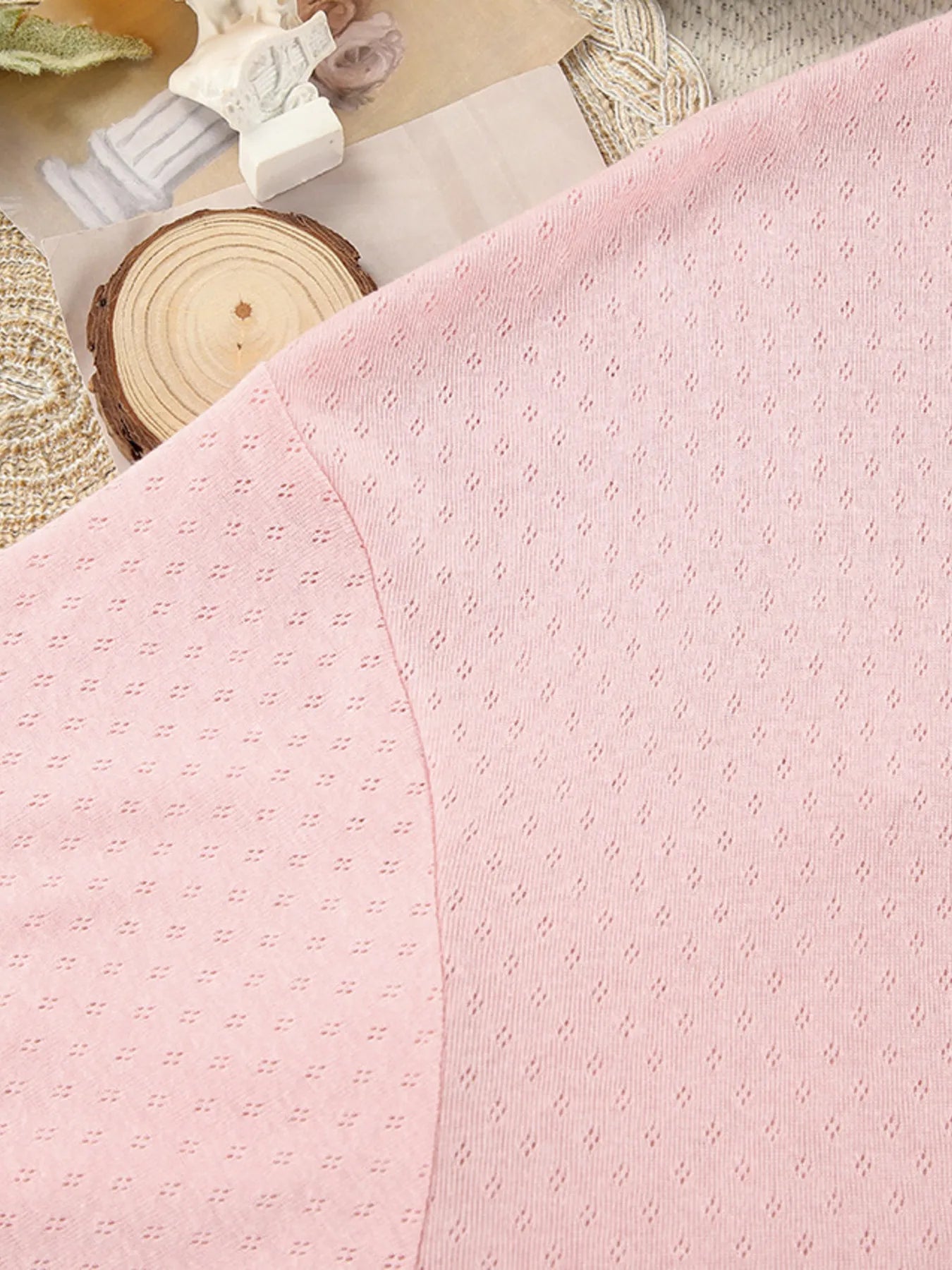 Close-up of the pink Tie Waist Kimono Sleeve Lounge Nightgown fabric with a subtle diamond pattern