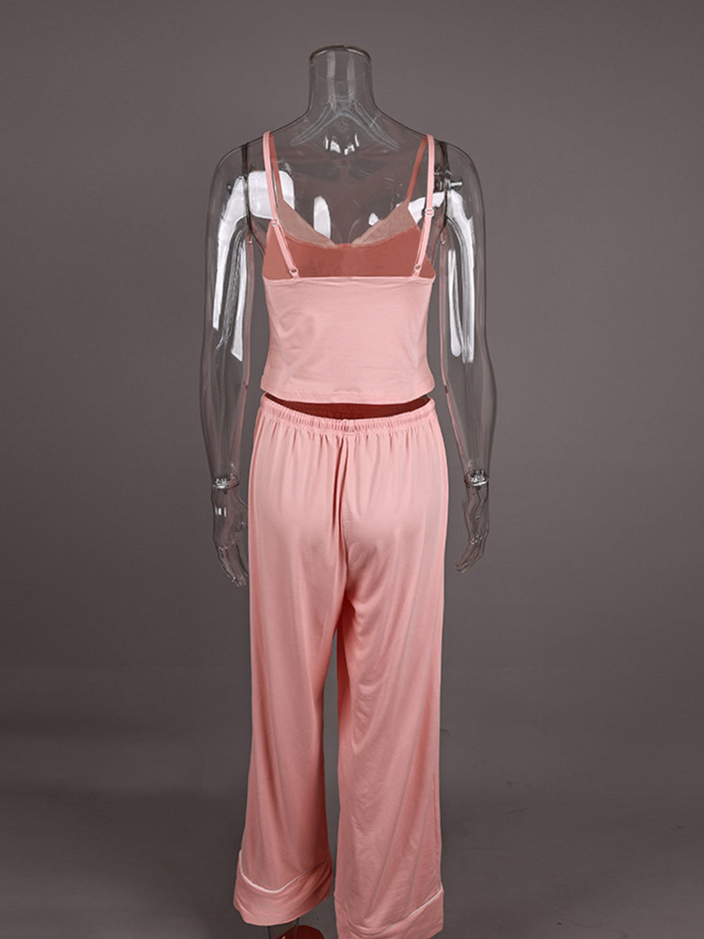 Back view of a pink Lace Trim Cami & Pants Lounge Set on a clear mannequin