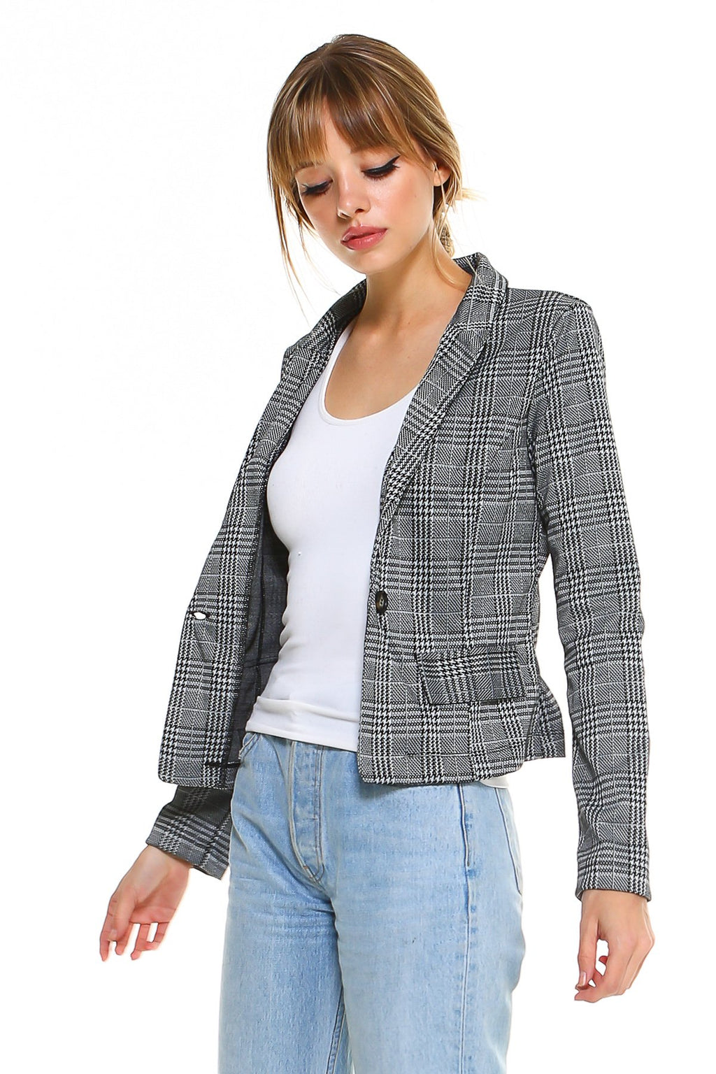 Classic Plaid Fitted Blazer in black and white plaid worn over a white top and light blue jeans
