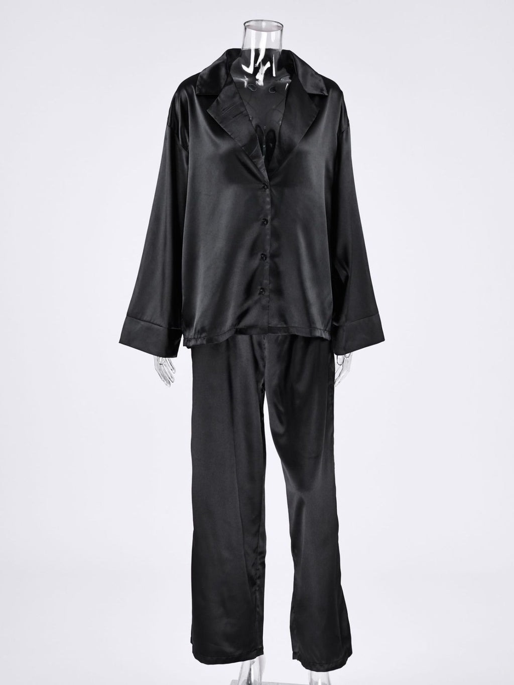 Long Sleeve Top and Wide Leg Pants Lounge Set in black satin on a mannequin
