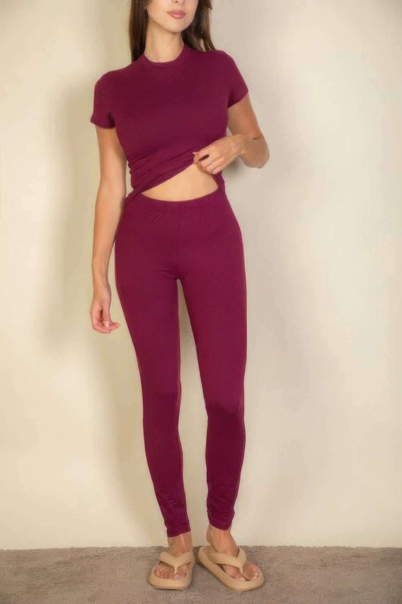 Woman wearing Burgundy Basic Solid Leggings and matching short-sleeved top