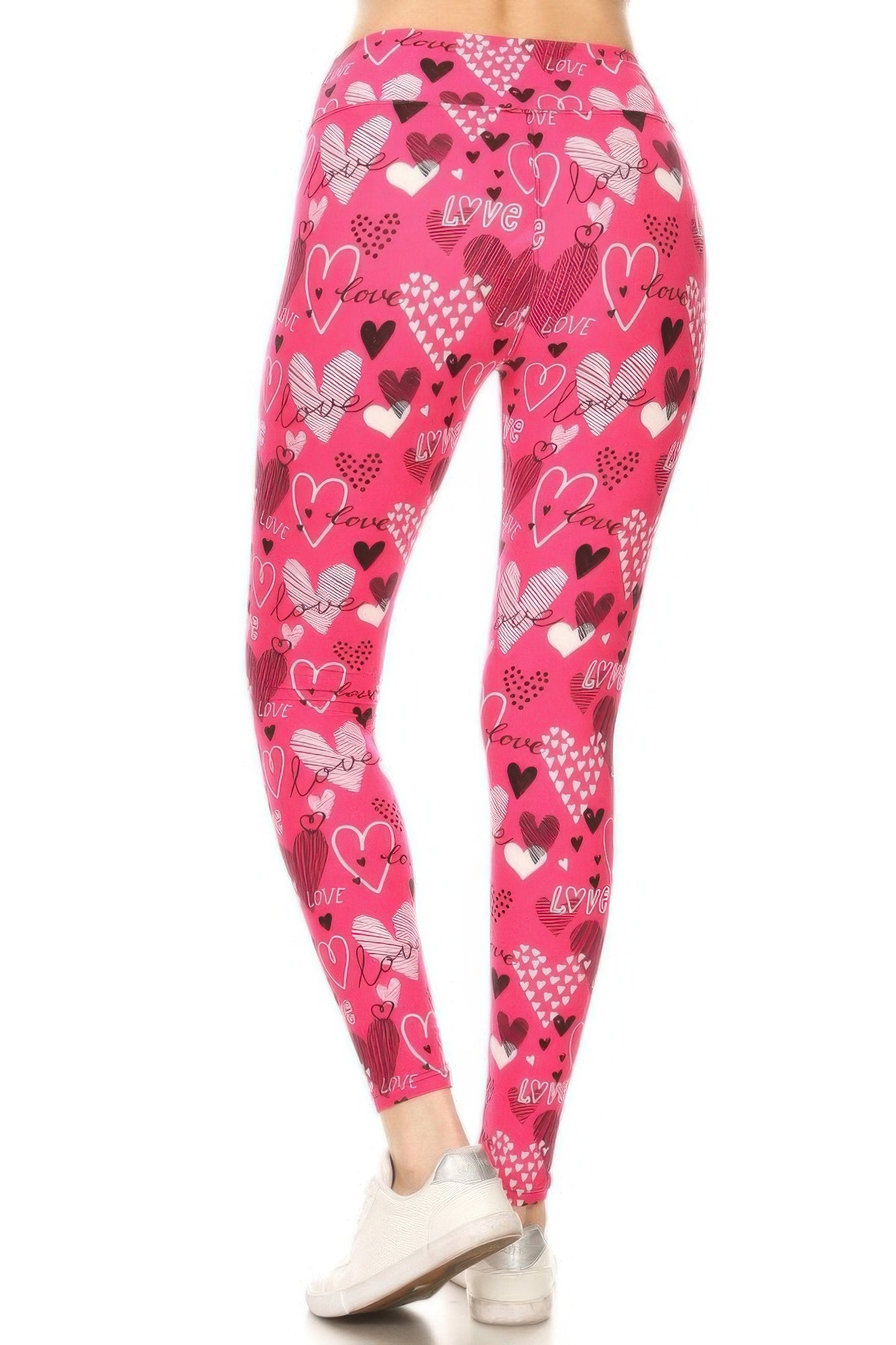 Heart Print High-Waist Leggings in pink with white, black, and red hearts and the word love