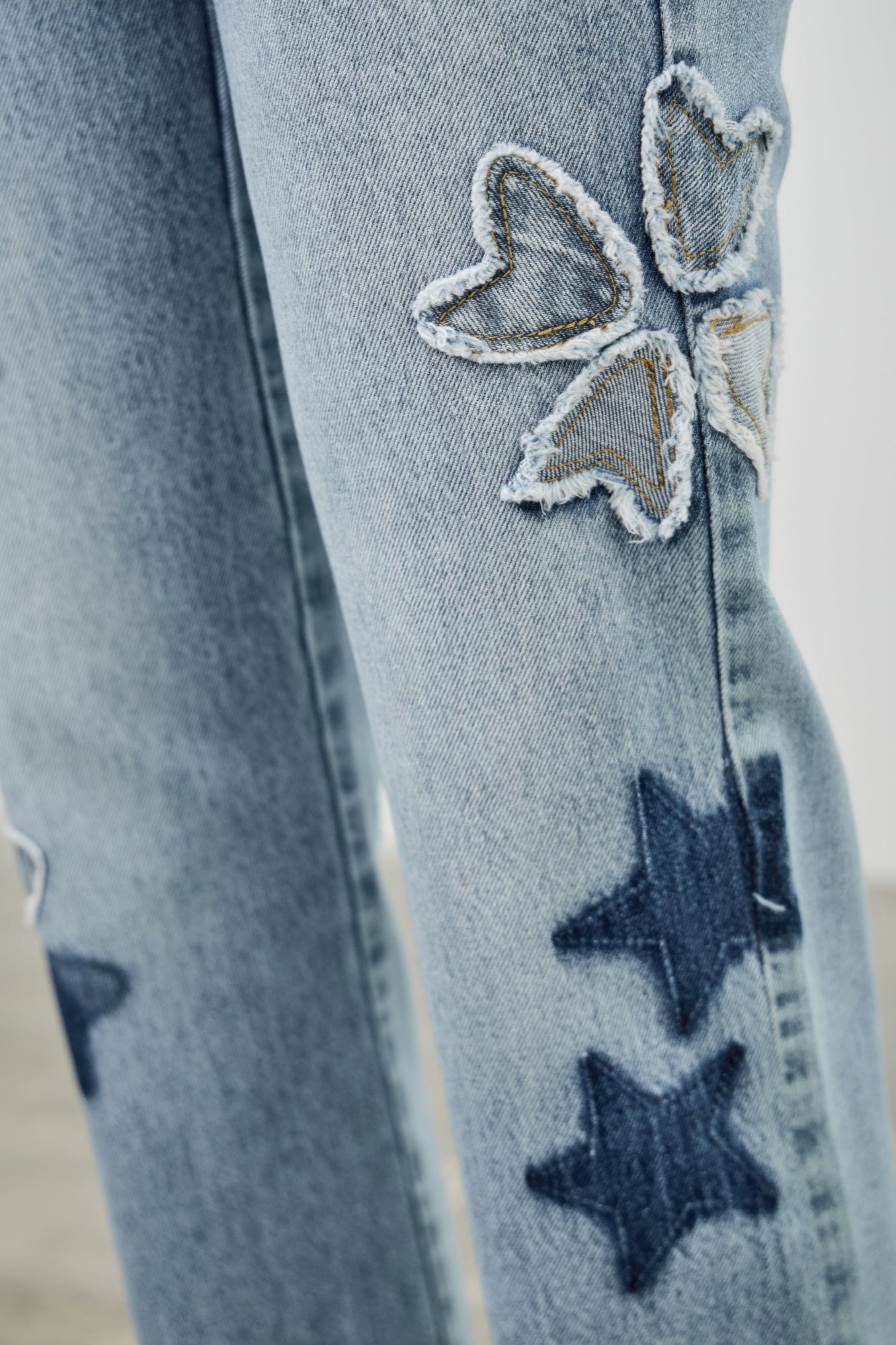 High Rise Star & Heart Patched Dad Jeans with Stretch, close up of heart and star patches