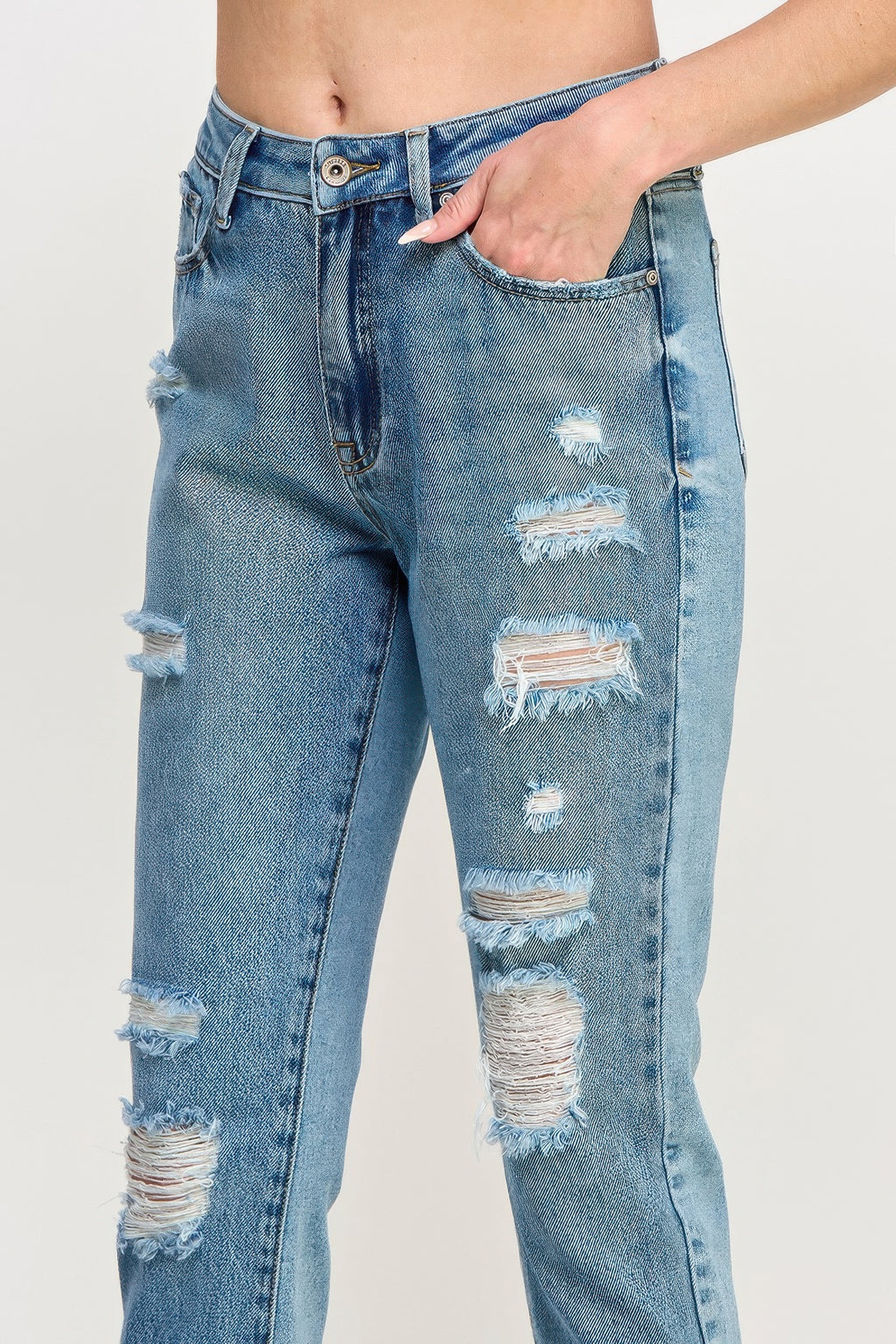 High Rise Distressed Relaxed Straight Jeans with a hand in the pocket