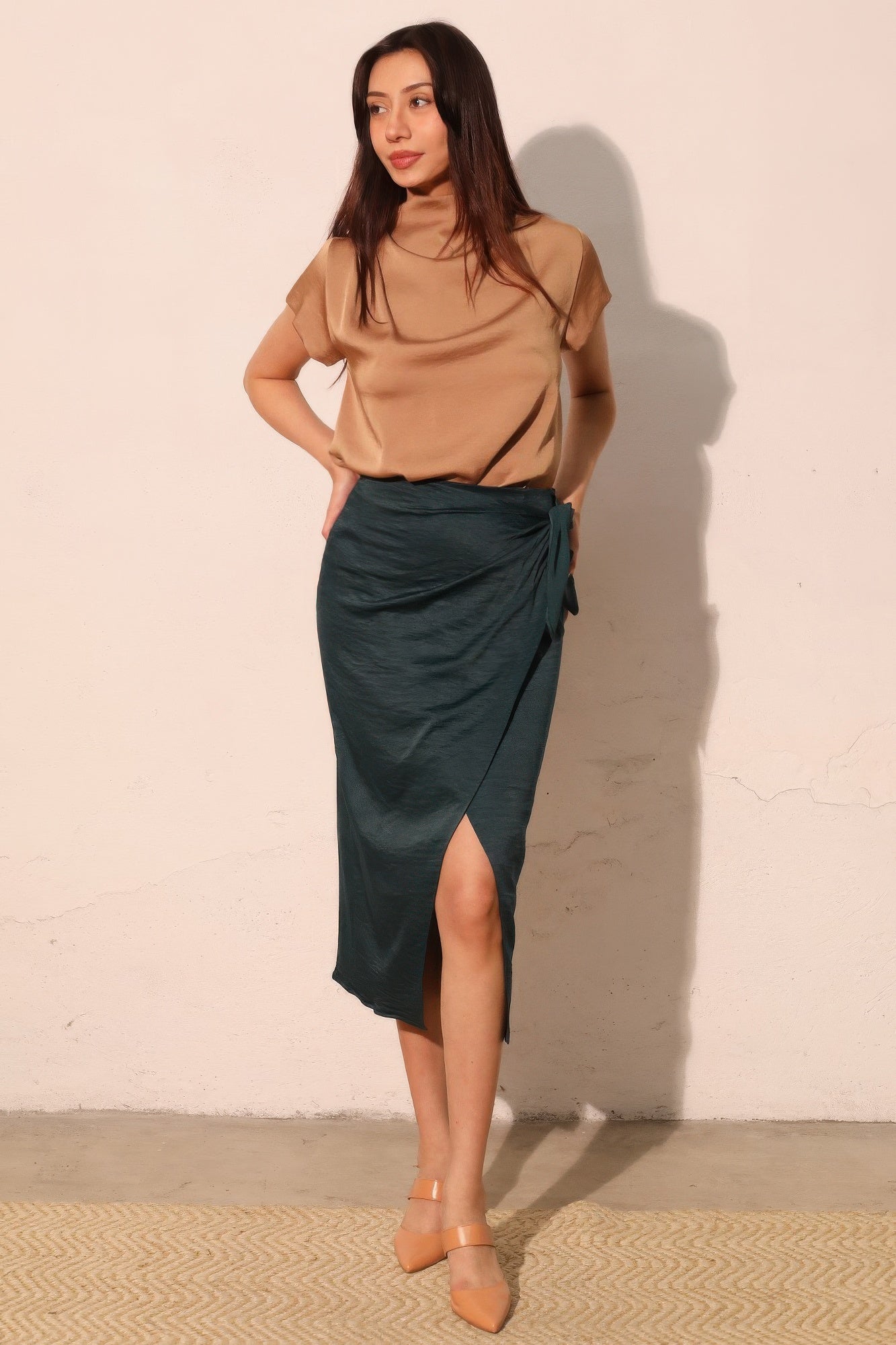 Midnight Teal Wrap-Front Midi Skirt with a tan top and tan heels