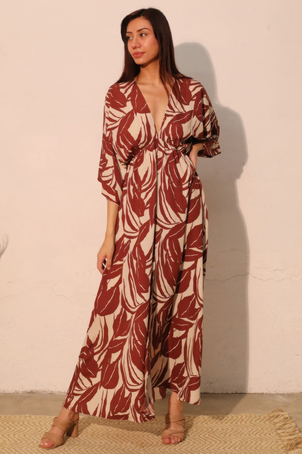 Kimono Maxi Dress with a deep V-neck and a brown and beige leaf pattern