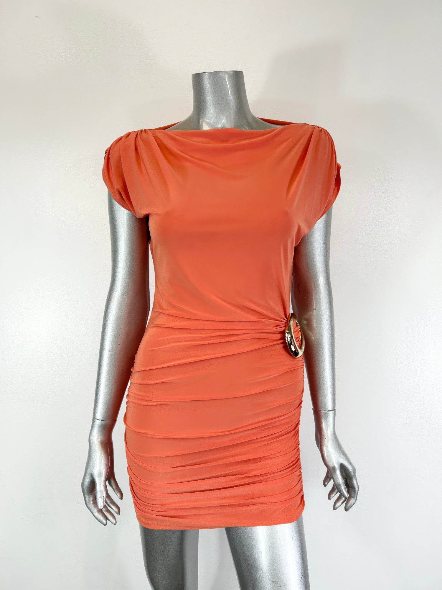 Burnt Orange Cap Sleeve Bodycon Mini Dress on a mannequin