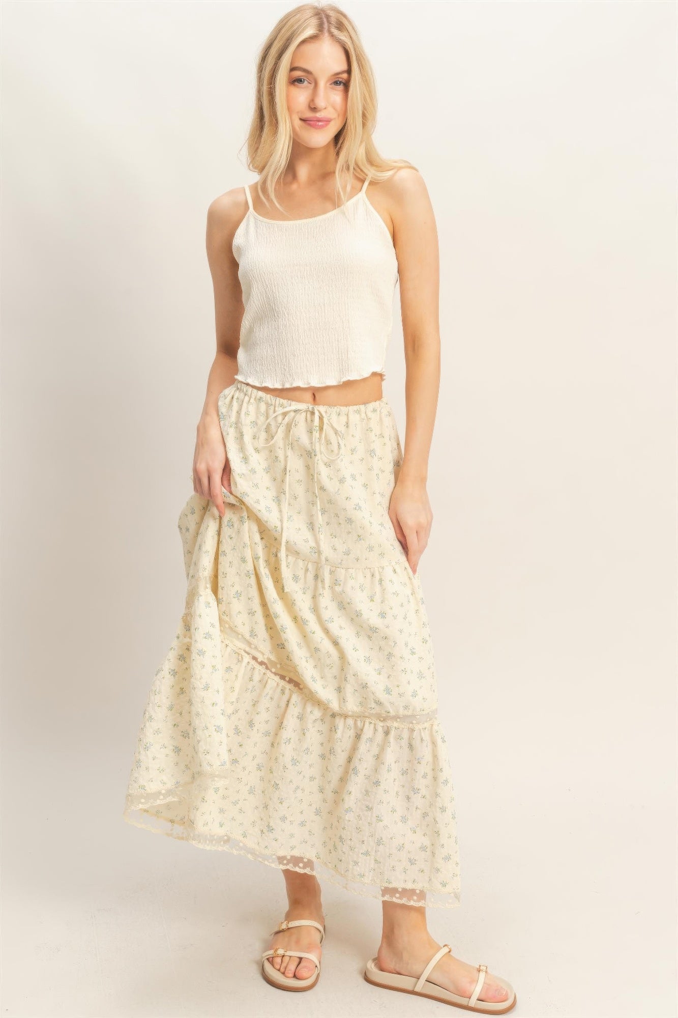 Woman in a white crop top and Vanilla Bluebell Tiered Midi Skirt