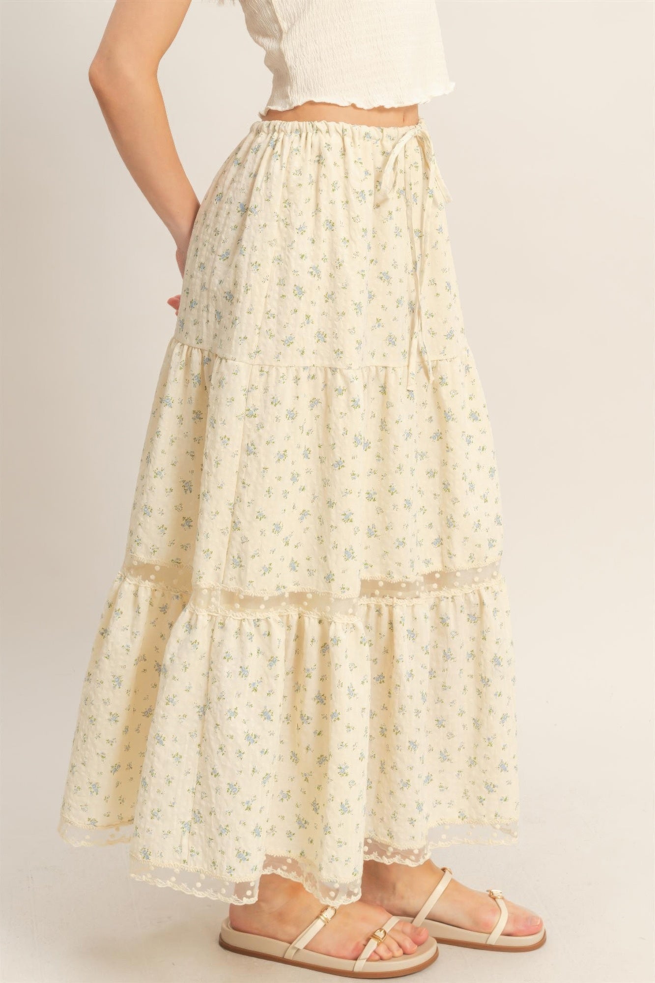 Vanilla Bluebell Tiered Midi Skirt with blue floral print and sheer lace details
