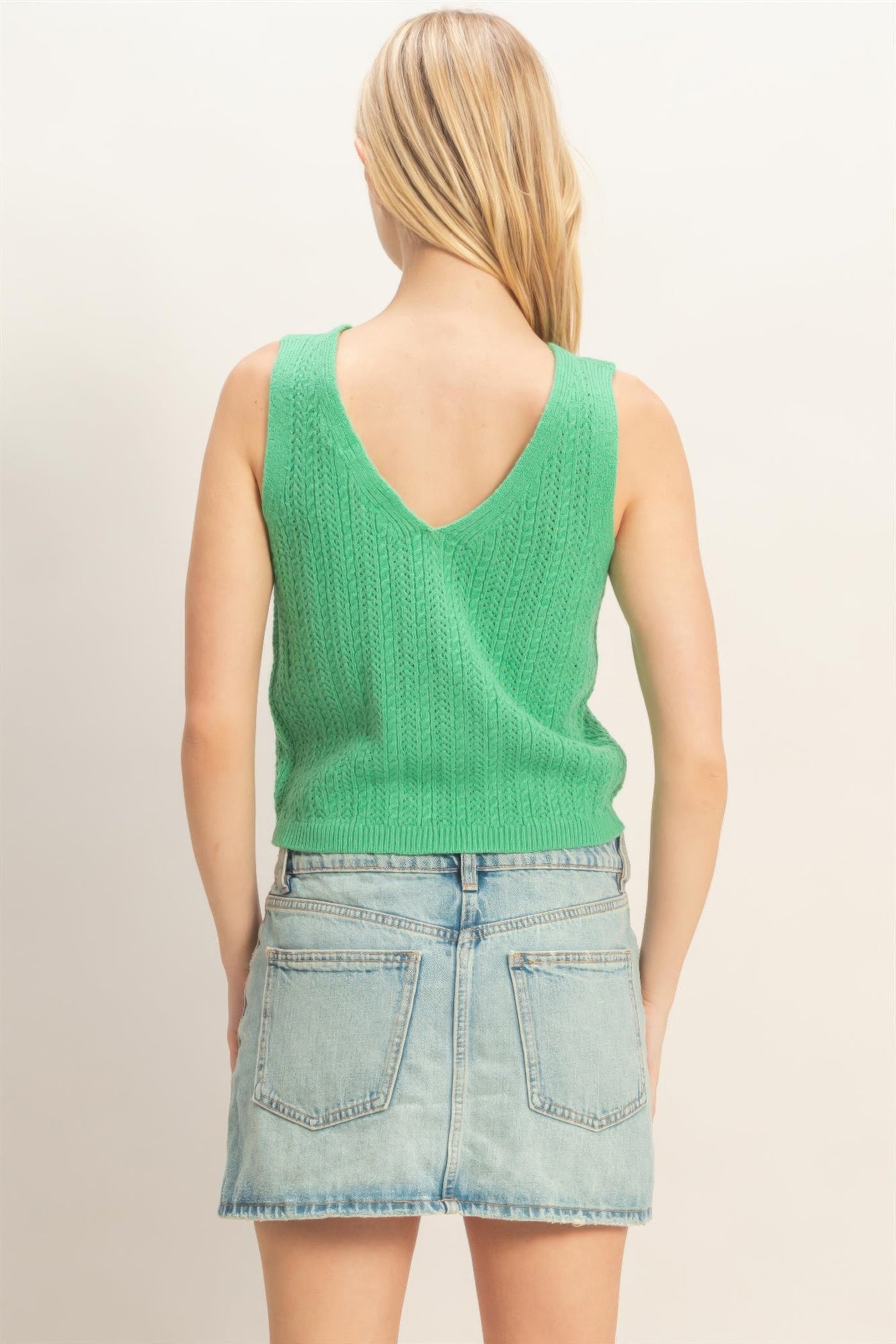 Verdant Clover Button-Front Knit Tank Top with a V-neck and light wash denim skirt