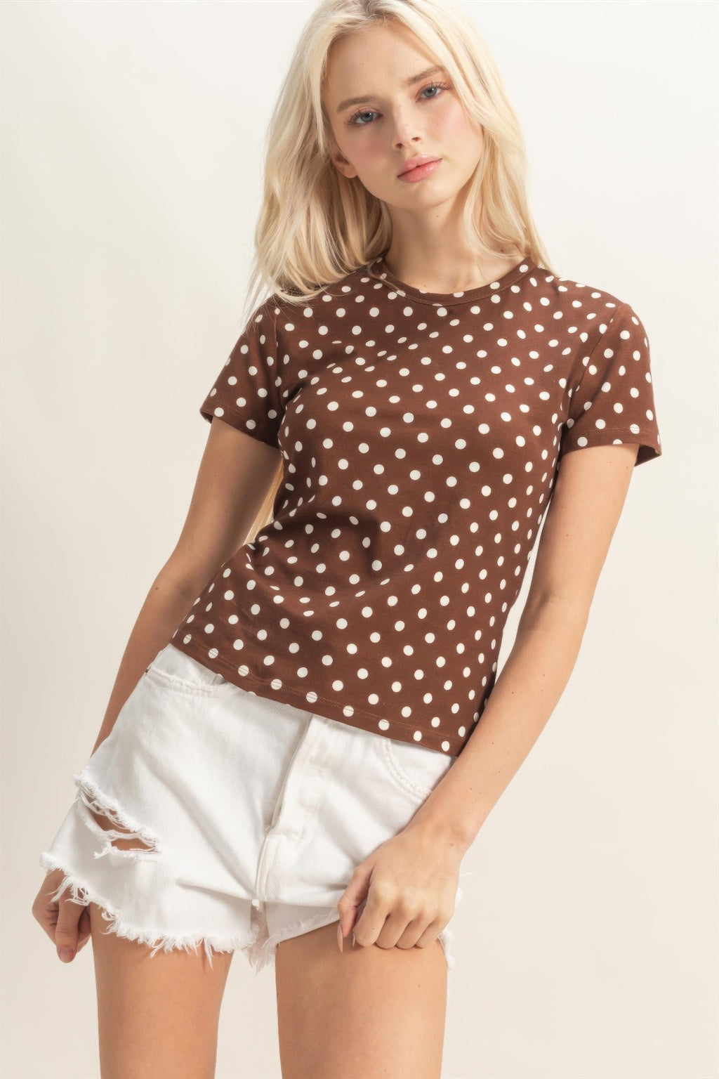 Cocoa Mocha Polka Dot Top with white polka dots paired with white distressed shorts