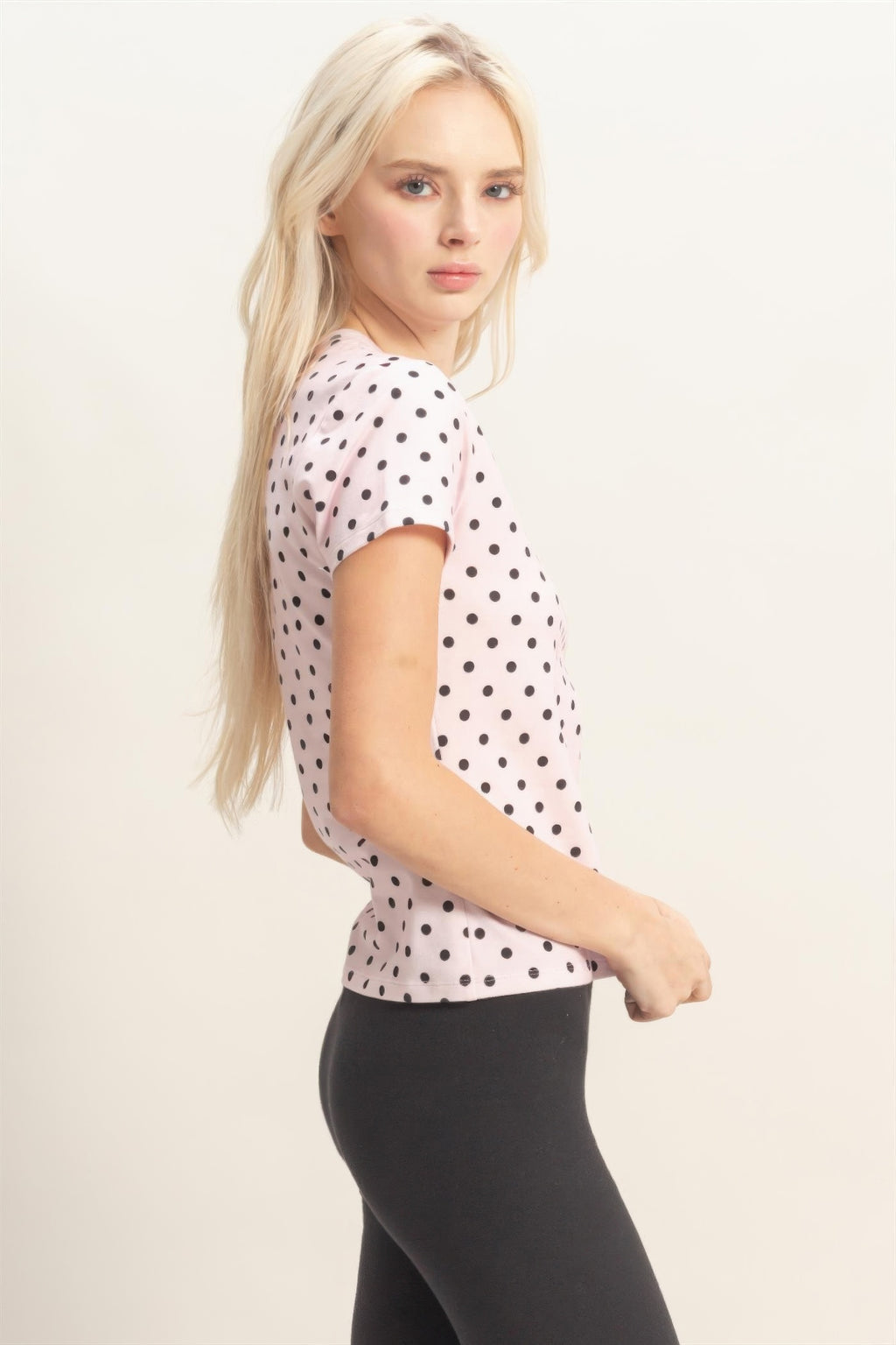 Blush Porcelain Polka Dot Fitted Short-Sleeve Top with black leggings