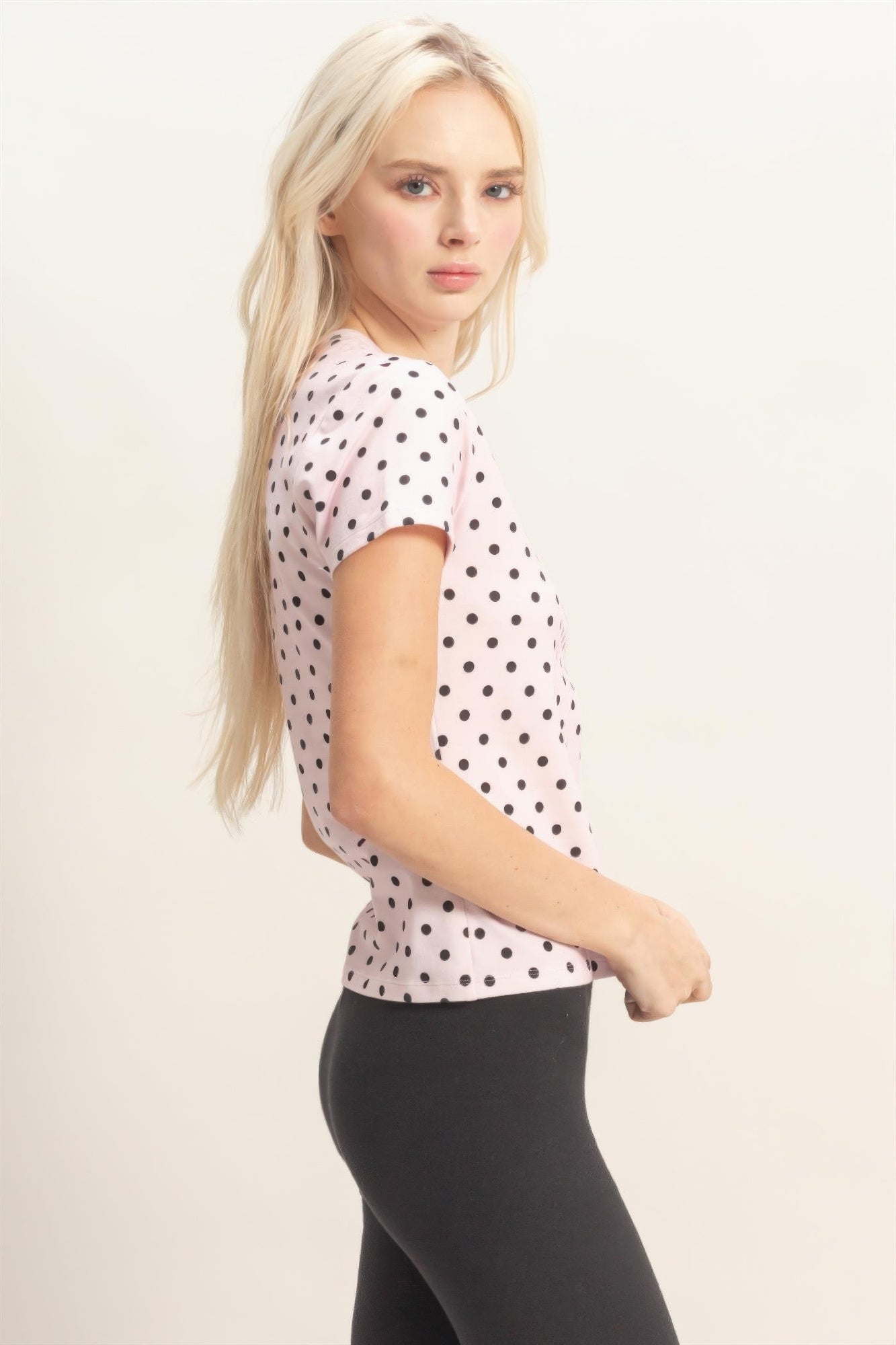 Blush Porcelain Polka Dot Fitted Short-Sleeve Top with black leggings