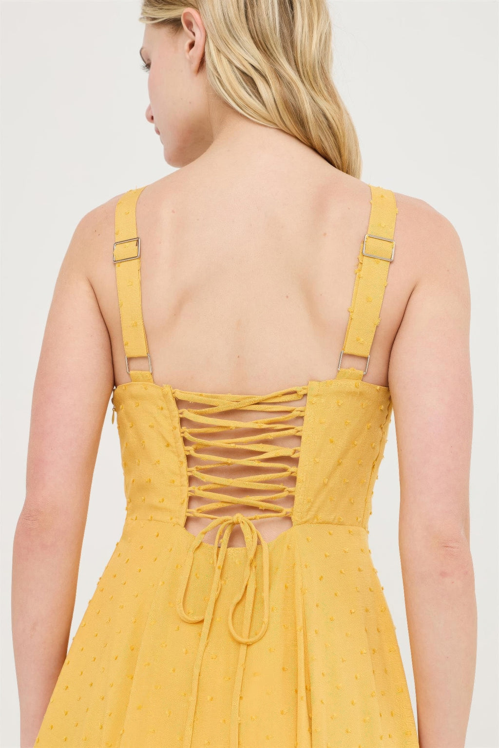 Back view of Sunlit Marigold Ruched-Bust Slit Maxi Dress with lace-up detail
