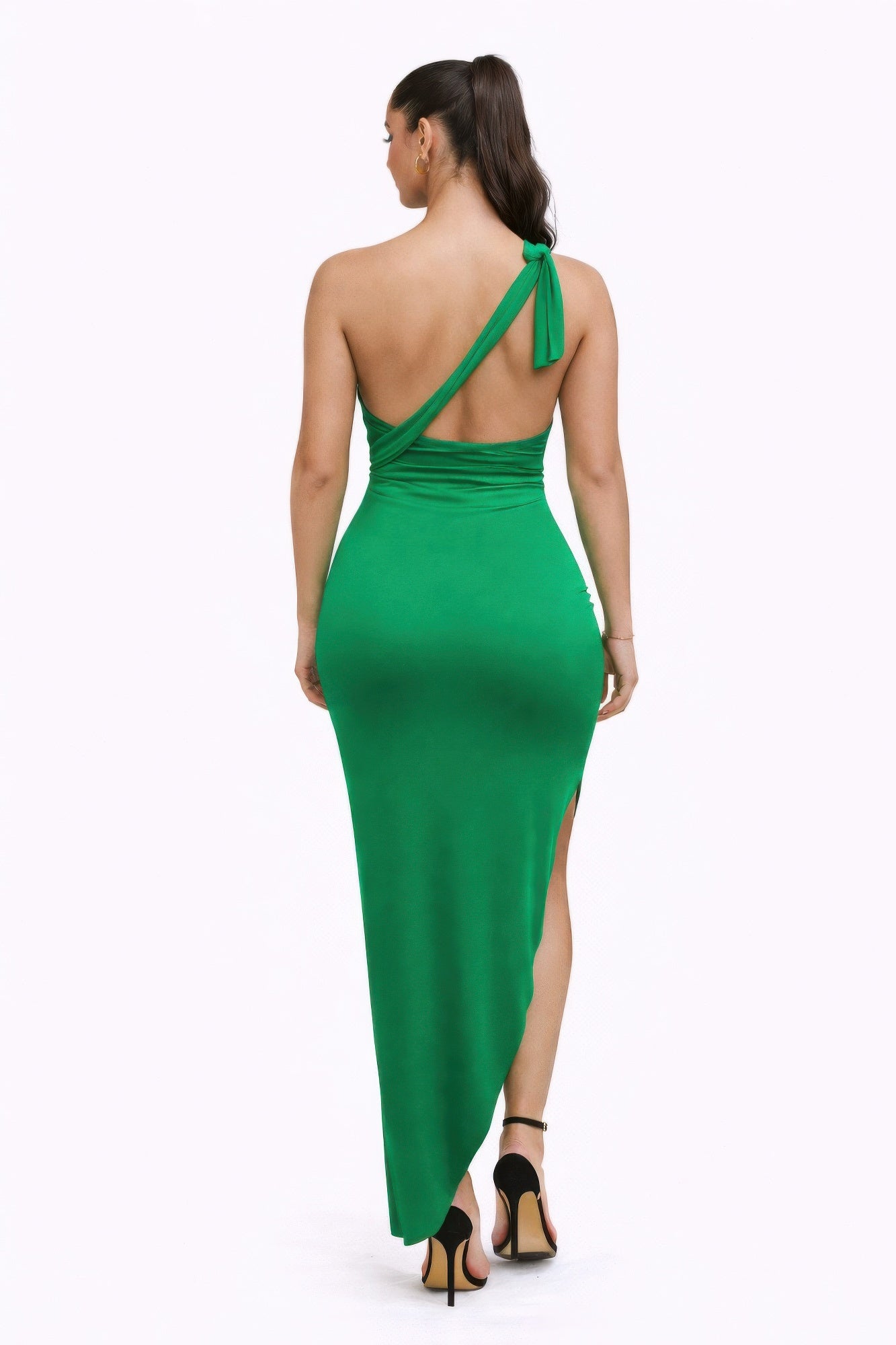 Back view of a woman in an Emerald Verve Halter Cutout Ruched Maxi Dress