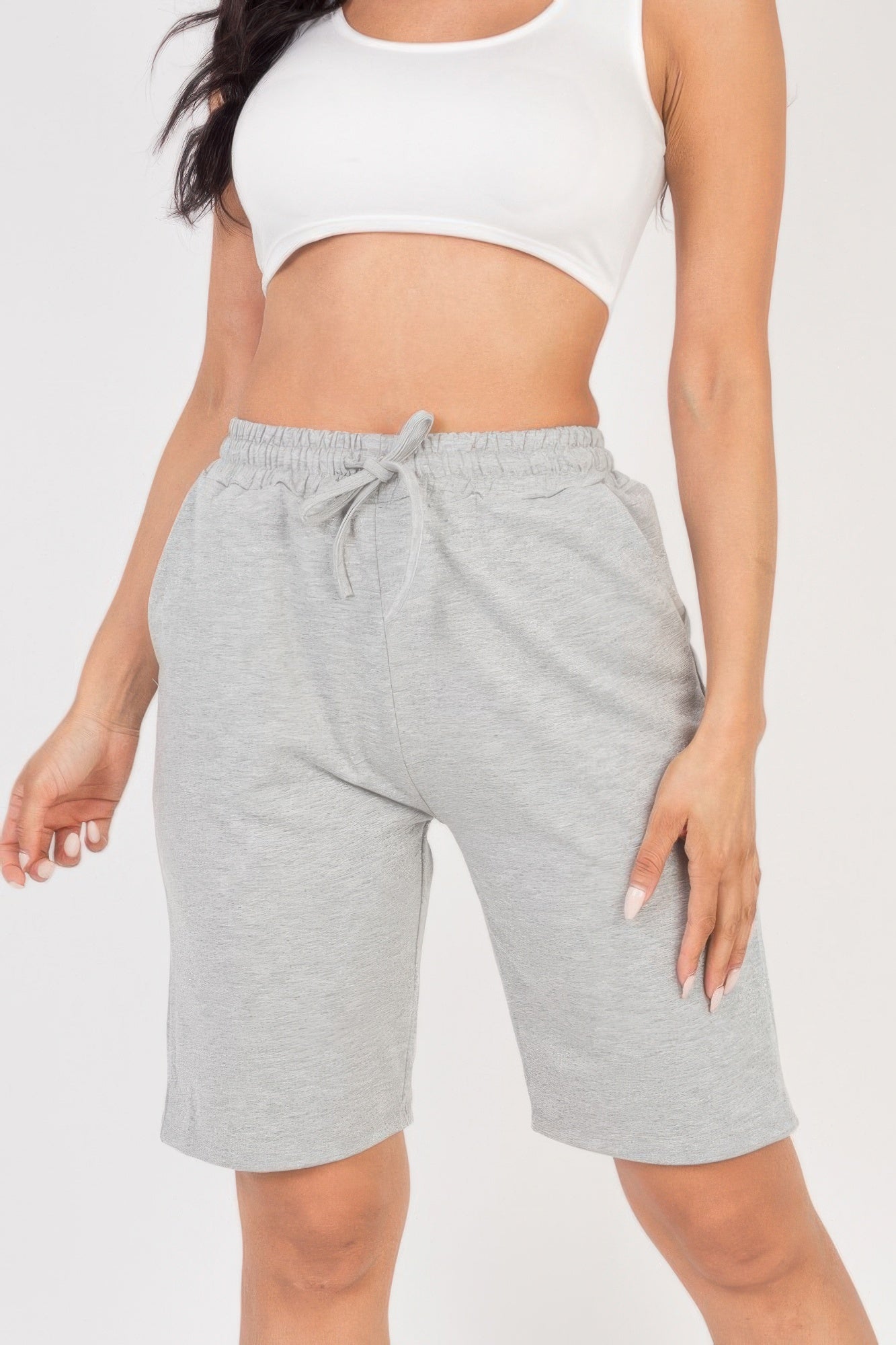 Smocked-Waist Bermuda Shorts in light grey with a white crop top