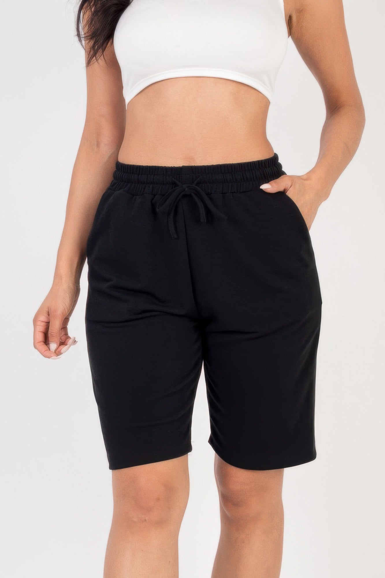 Smocked-Waist Bermuda Shorts in black with a drawstring waist and side pockets