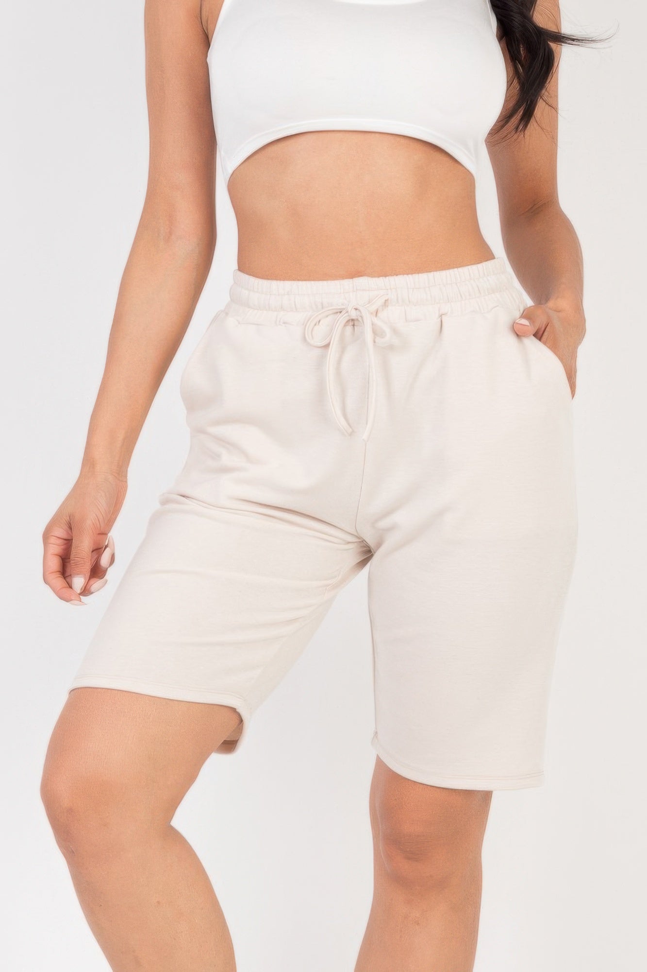 Smocked-Waist Bermuda Shorts in light beige with a drawstring waist and side pockets