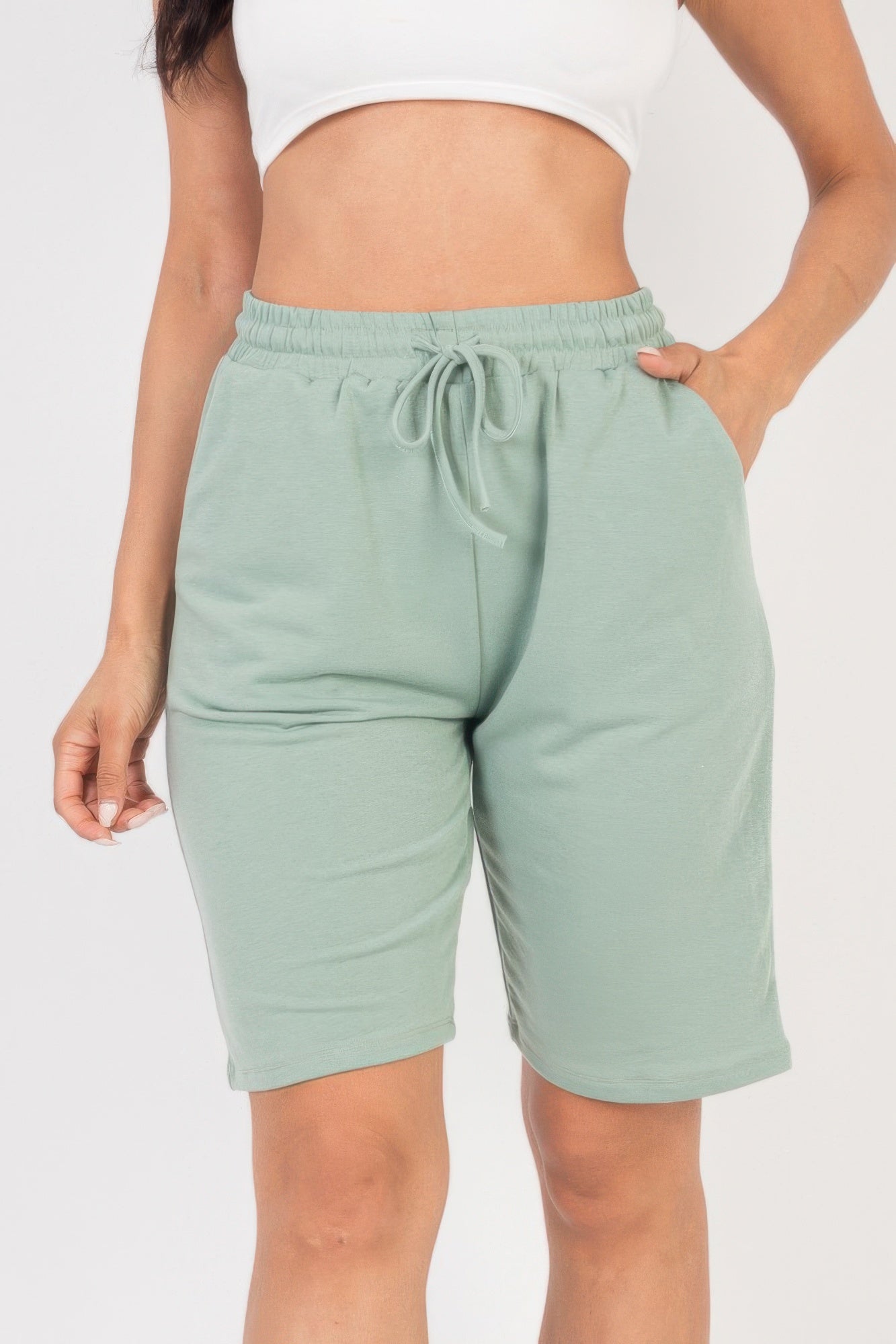Smocked-Waist Bermuda Shorts in light green with a drawstring waist and side pockets