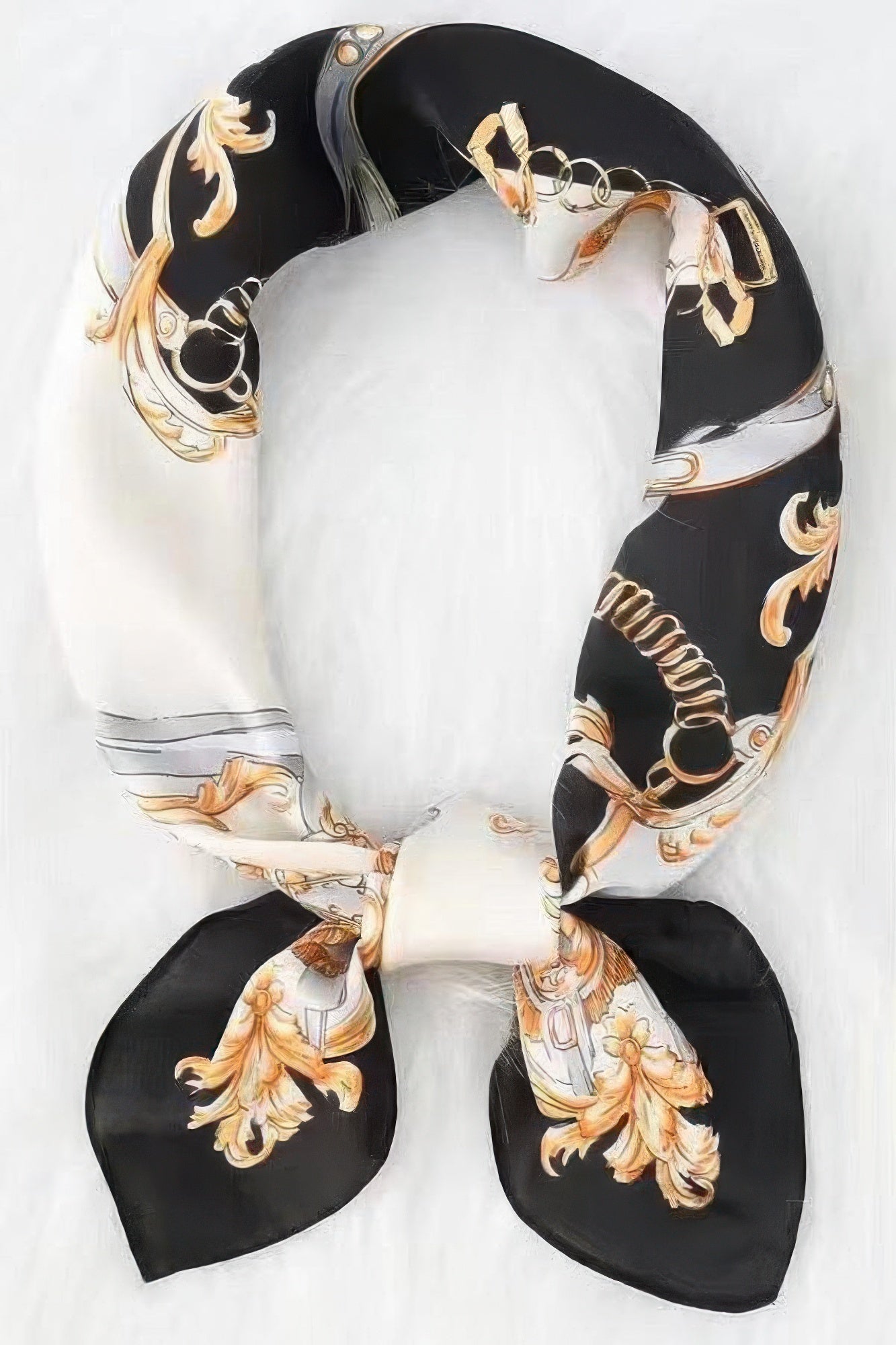 Multi Print Bandana with black, white, and gold chain and scroll patterns, tied in a knot