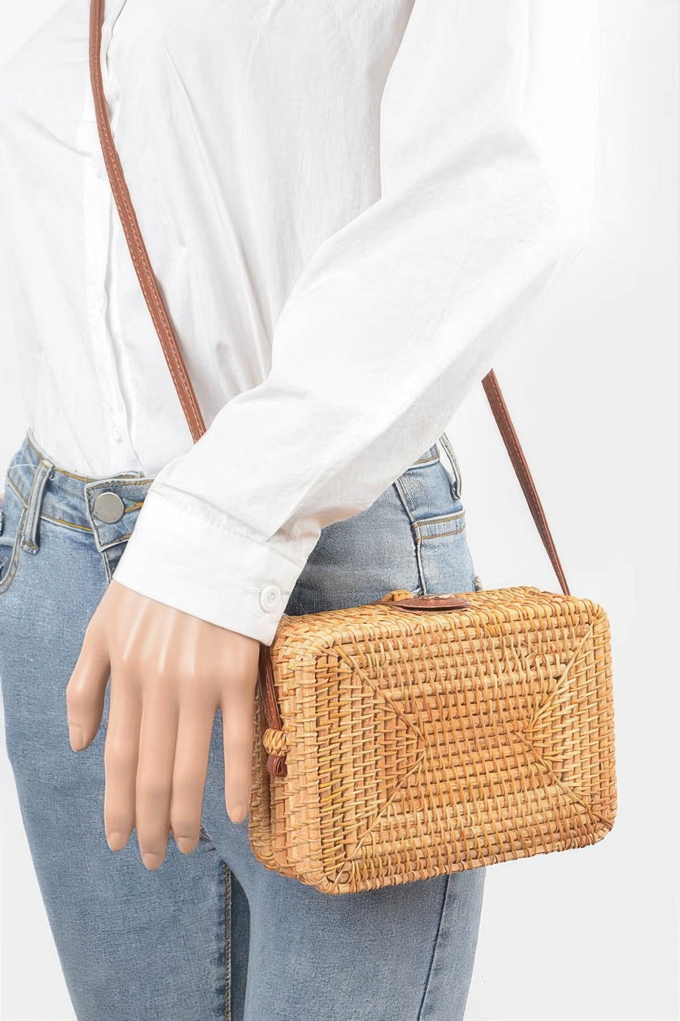 Crossbody Bamboo Box Bag worn by a person in a white shirt and blue jeans