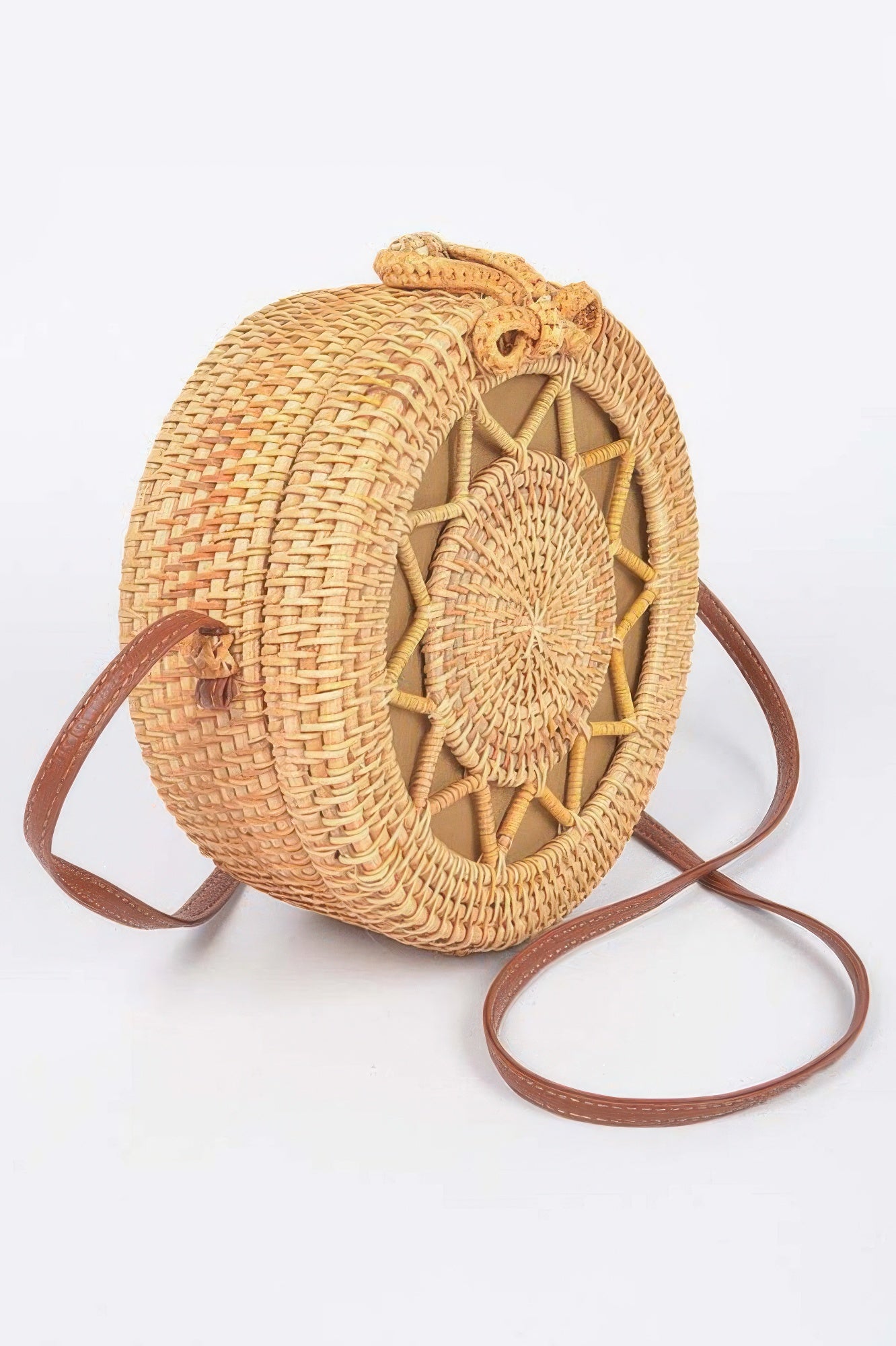 Bamboo Round Crossbody Bag with brown leather strap and woven pattern