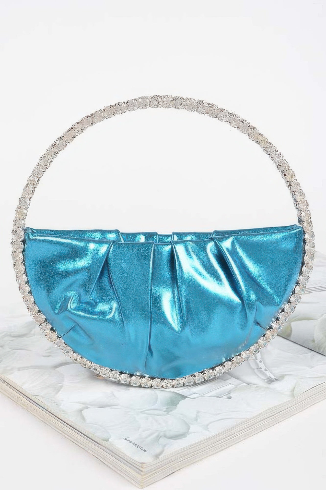 Metallic Luna Bag with stone handle in a vibrant blue color