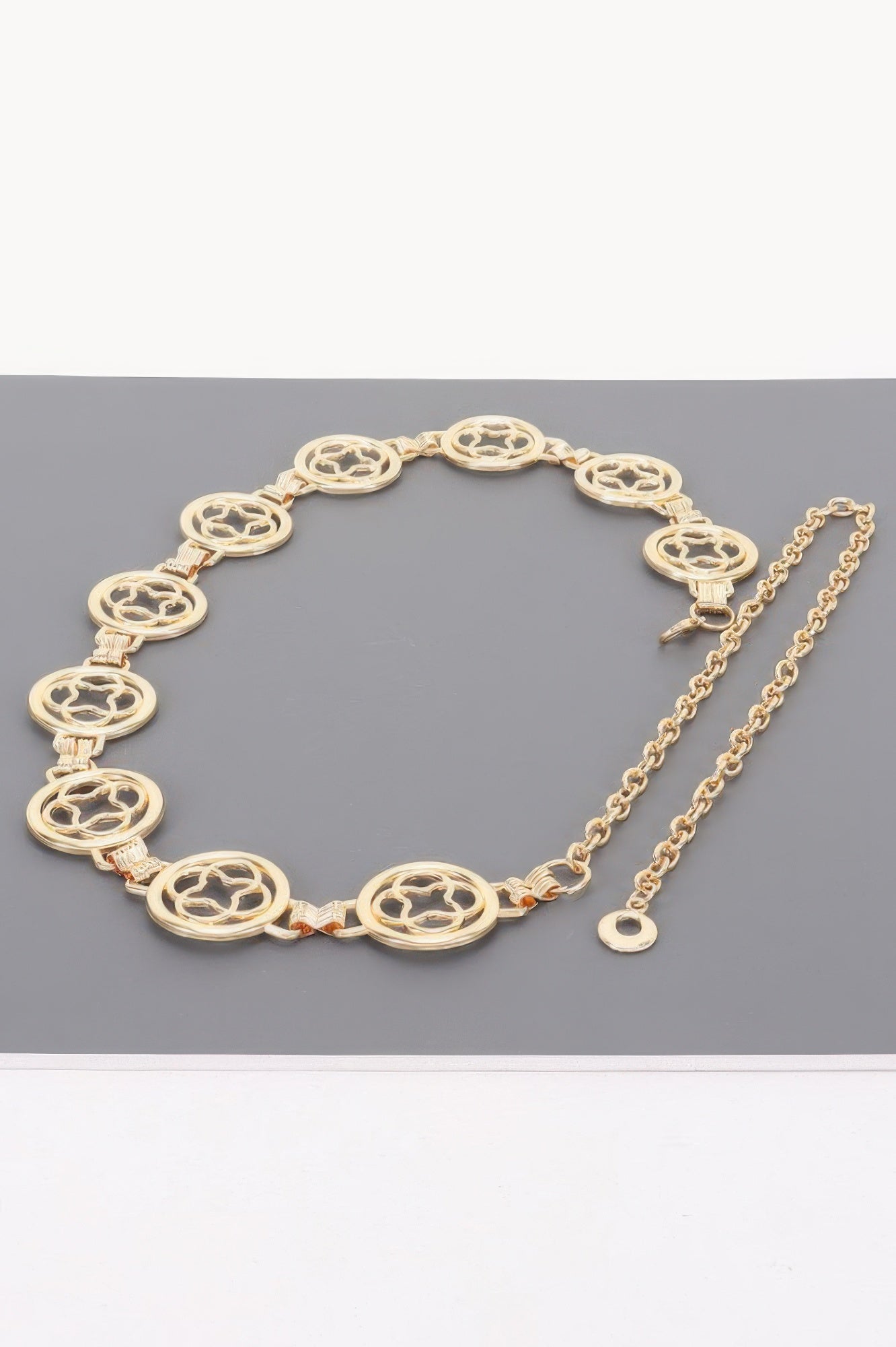 Chain Belt with gold circular links and star cutouts