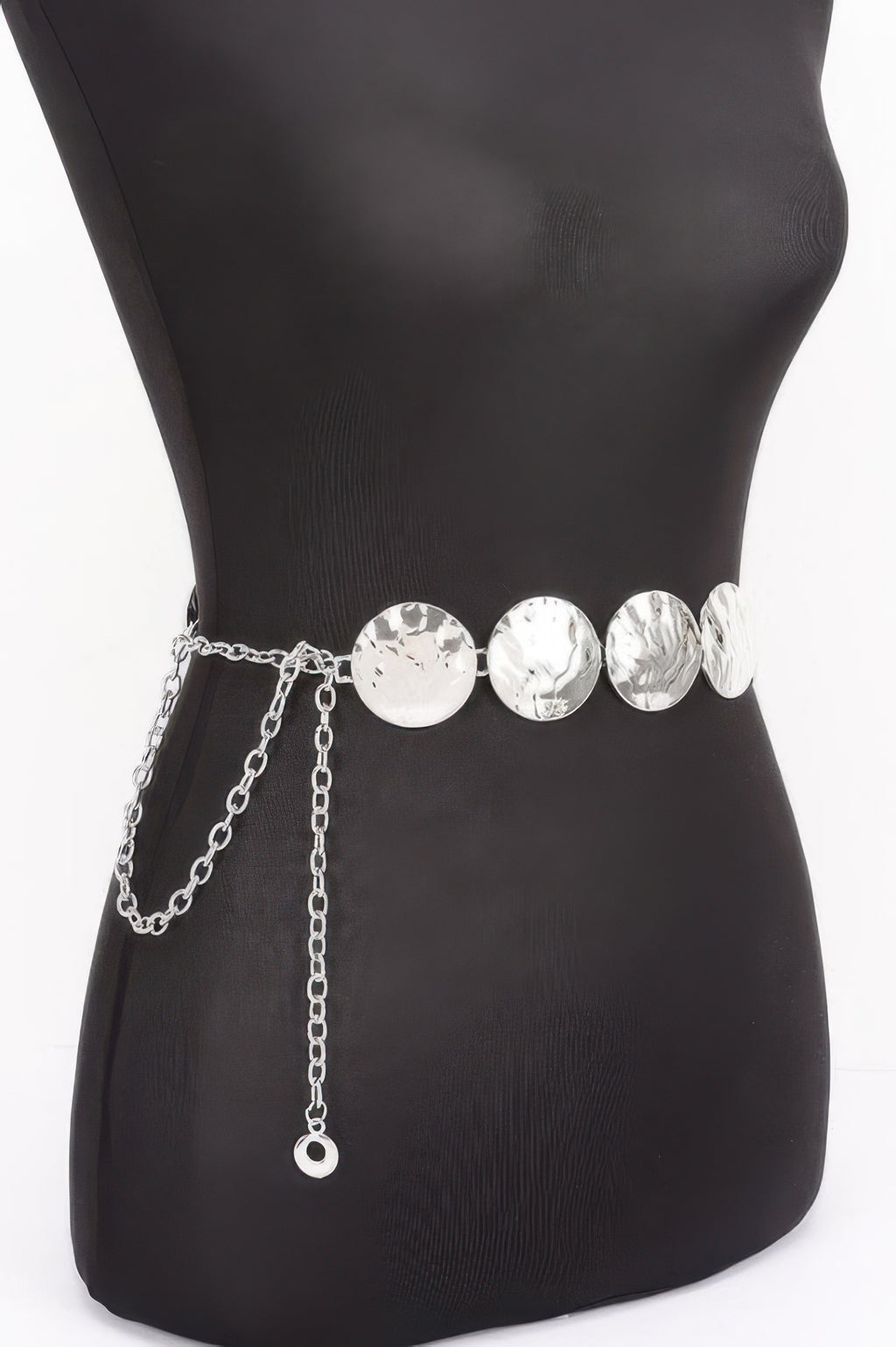 Vintage Chain Belt with hammered silver discs on a black mannequin