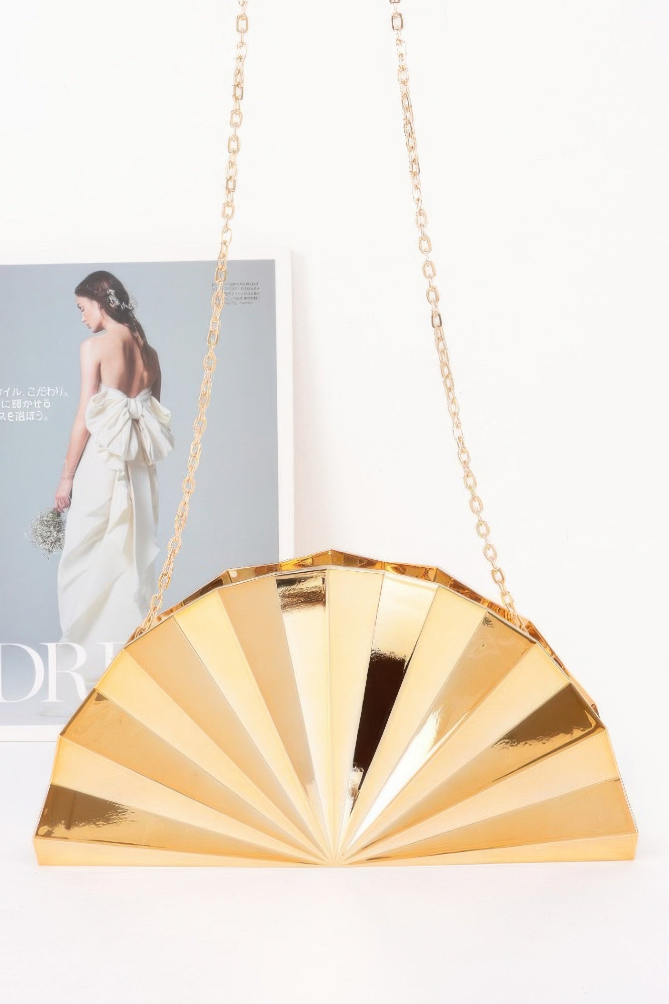 Metallic Acrylic Party Clutch in a fan shape with a gold chain strap