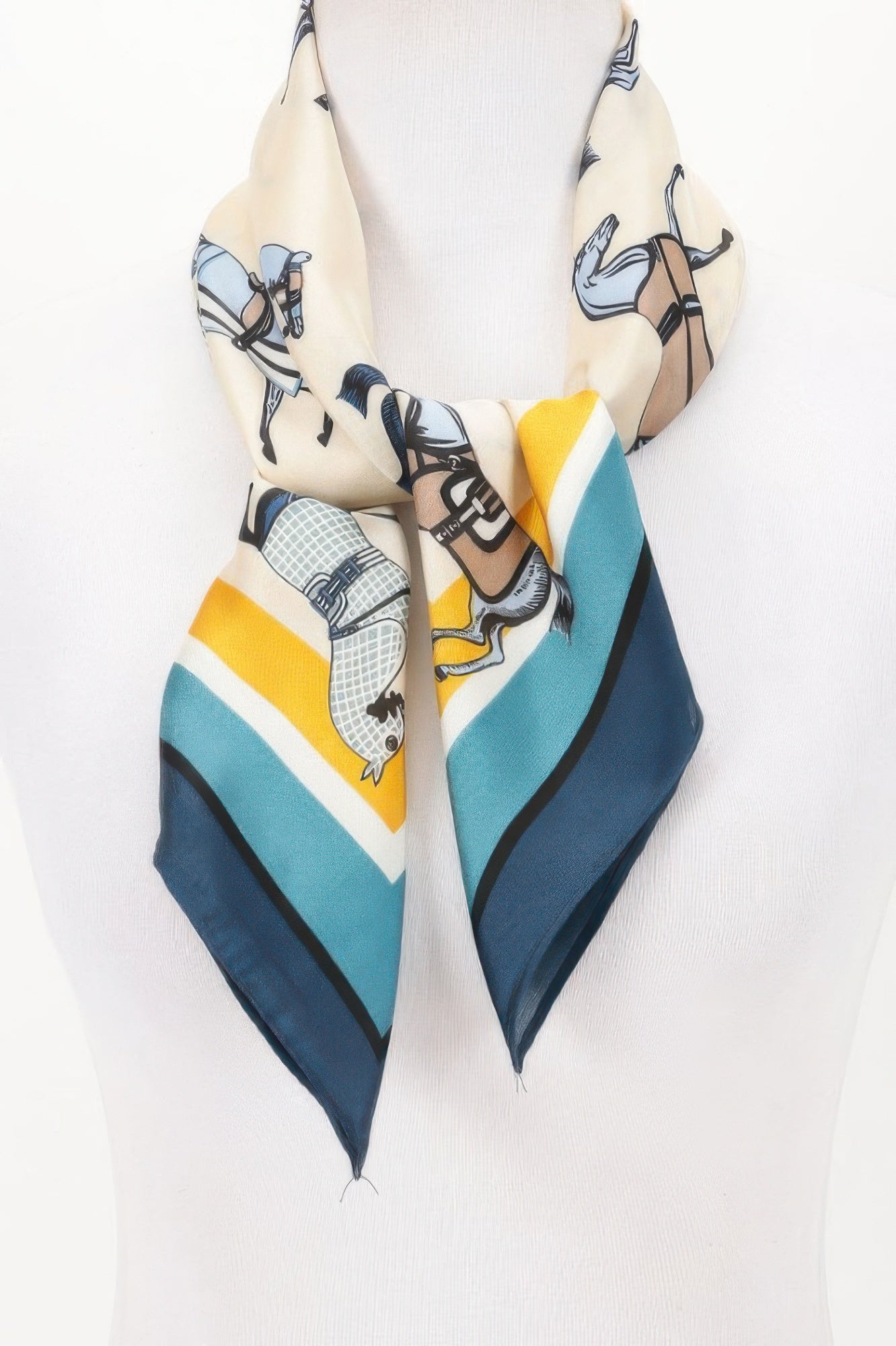 Multi Print Bandana with horse and saddle print, tied around a white mannequin neck