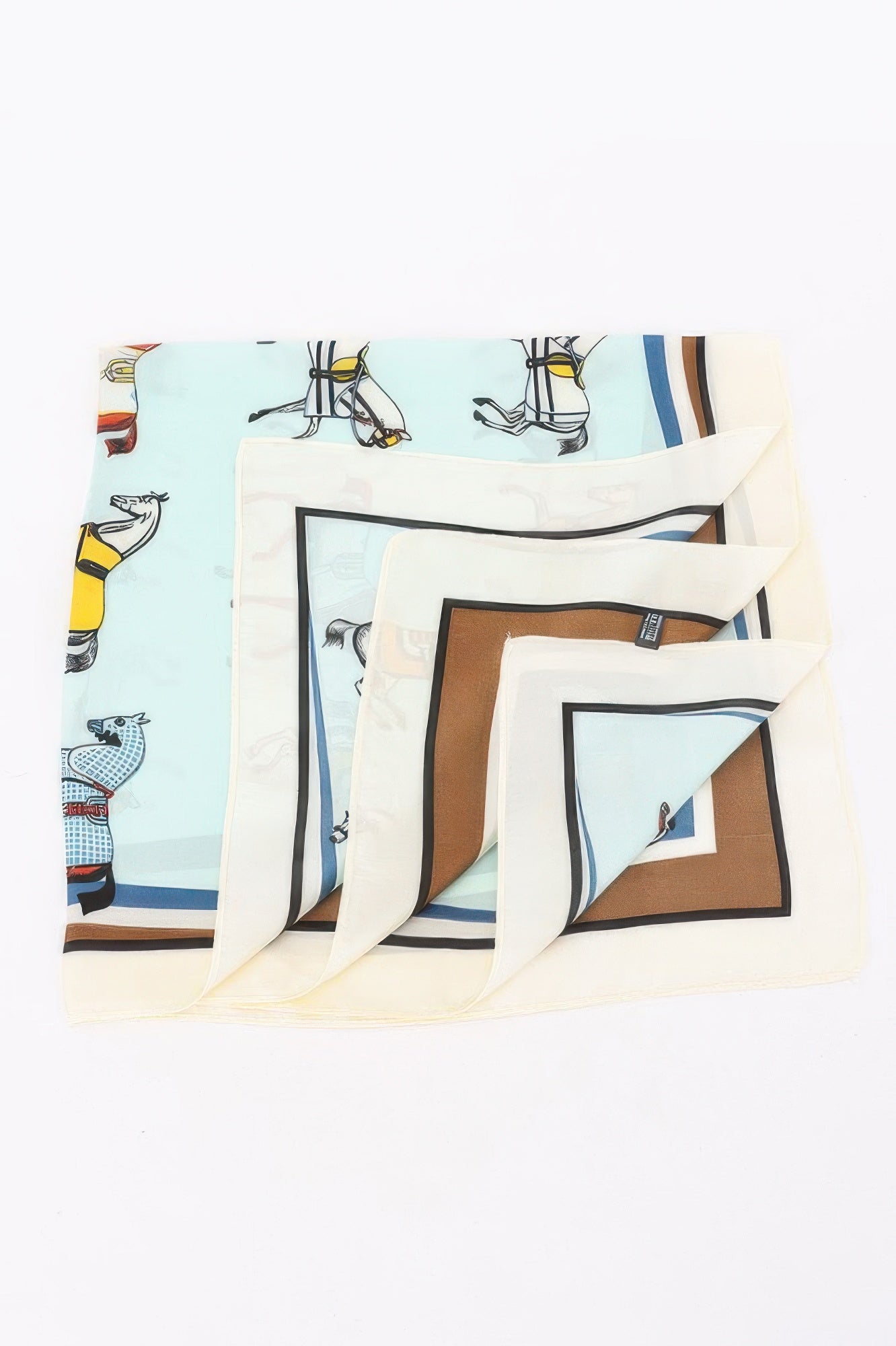 Multi Print Bandana, light blue with horse and saddle print, folded to show brown and white border