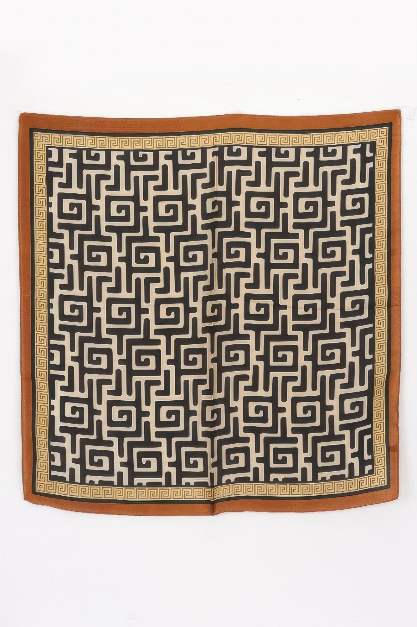 Multi Print Bandana with a black and beige geometric pattern and a brown and gold border